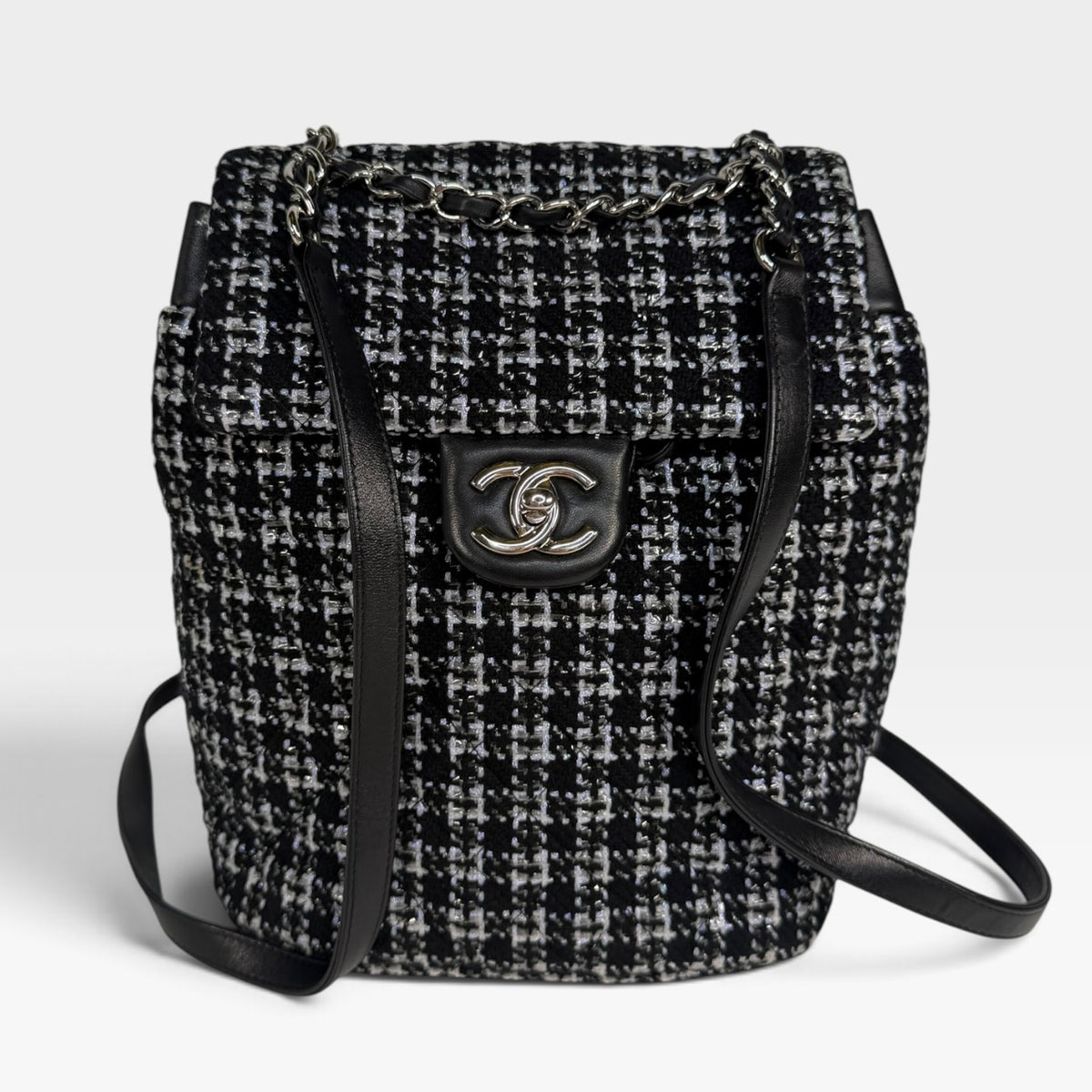 Chanel Backpack In Black & Grey Tweed With Silver Hardware. Authentic and preloved in excellent condition. 100% Guarantee