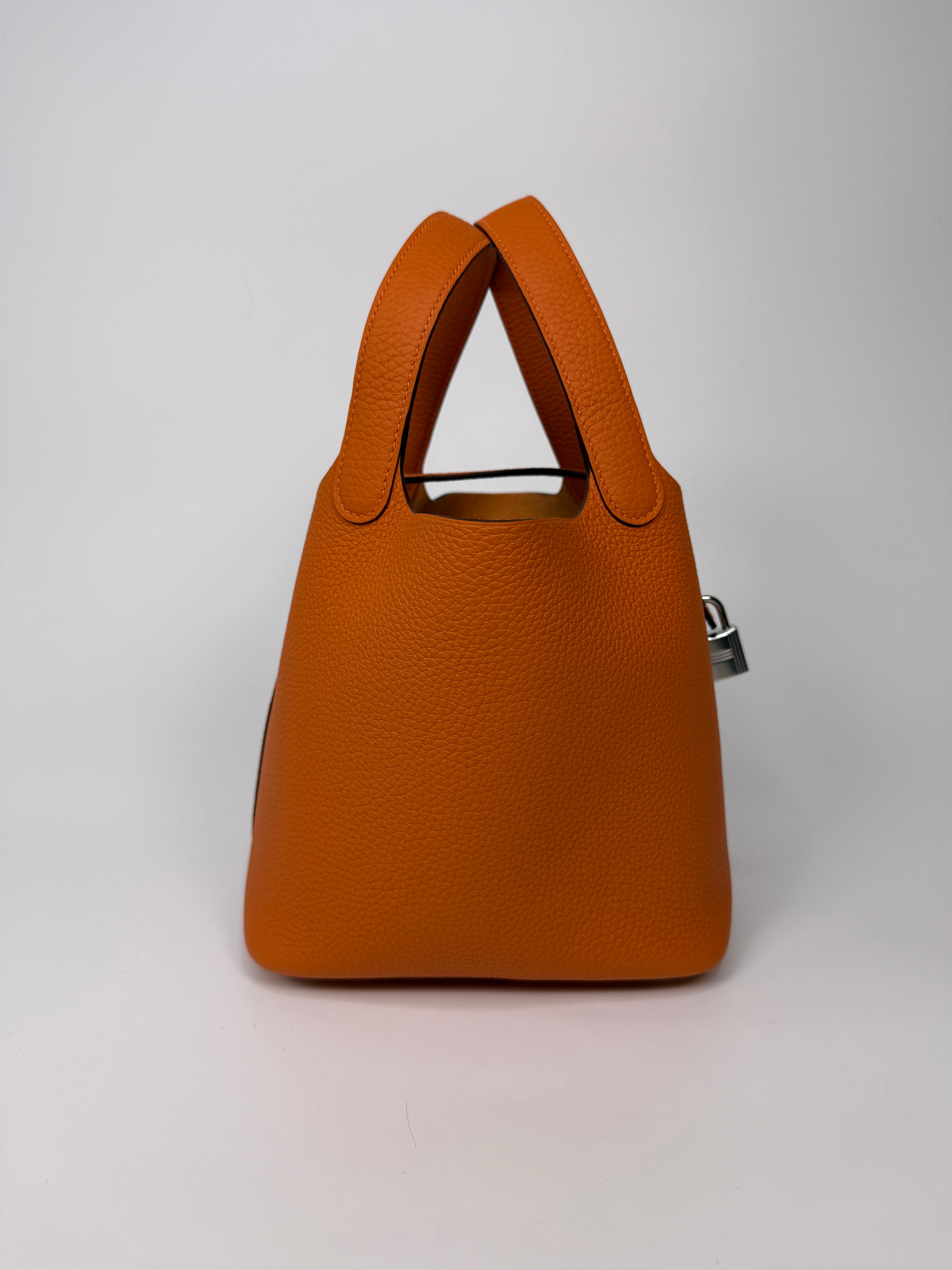 Hermès Picotin 18 In Orange Clemence Leather With Palladium Hardware
Authentic Pre Loved Verified by Luxe Cheshire Trusted Designer resale