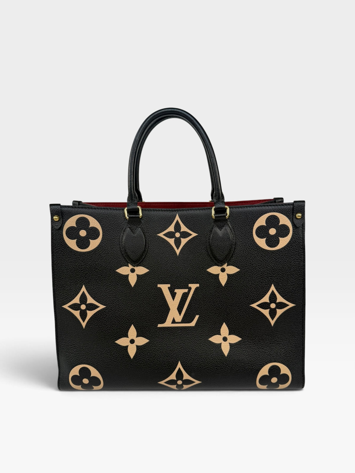 Louis Vuitton On The Go MM Tote In Black & Beige Leather With Gold Hardware. 100% authentic and preloved in excellent condition