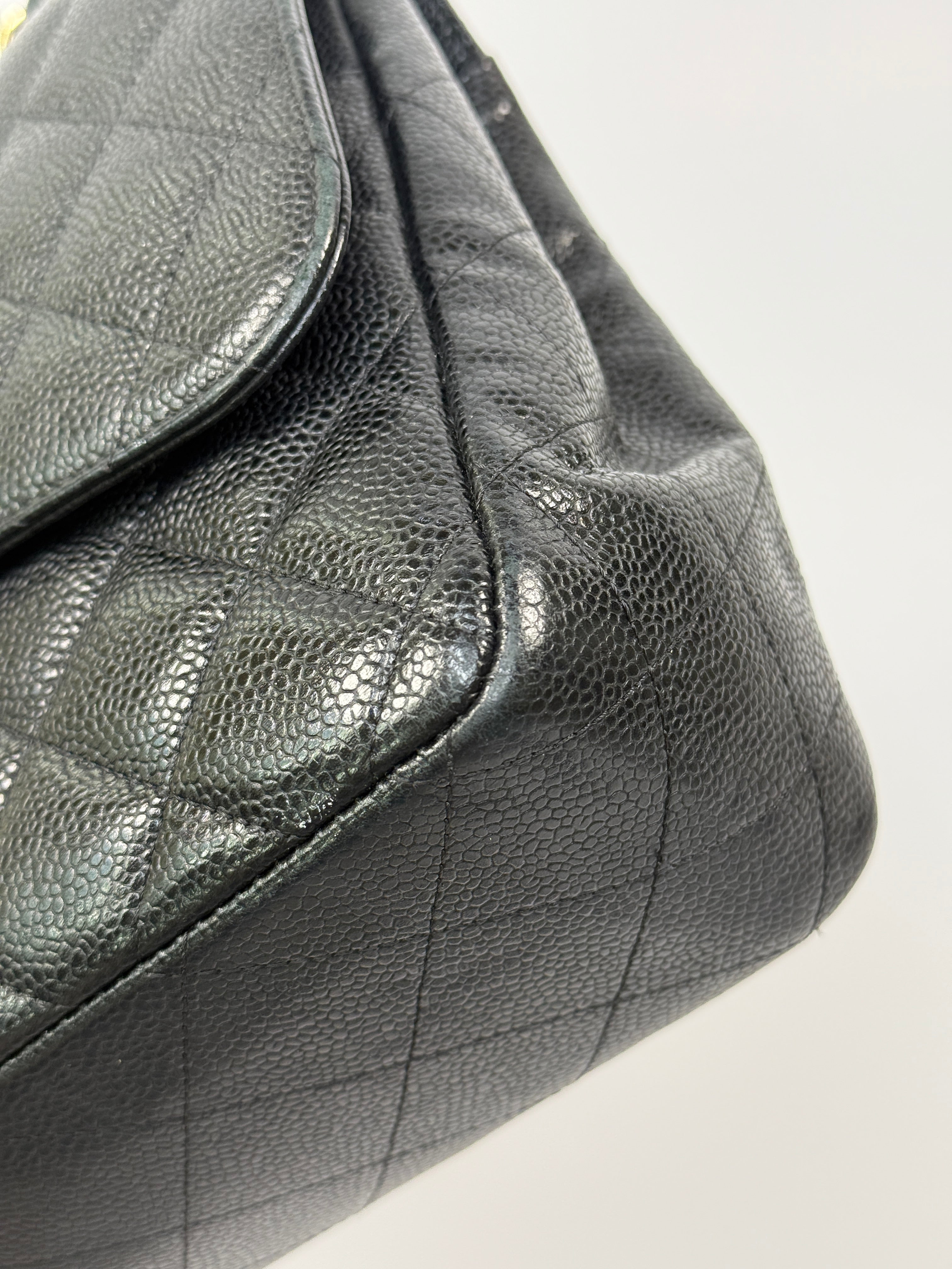 Chanel Classic Jumbo Flap Bag In Black Caviar LeatherWith Gold Hardware
Pre Loved & Authentic