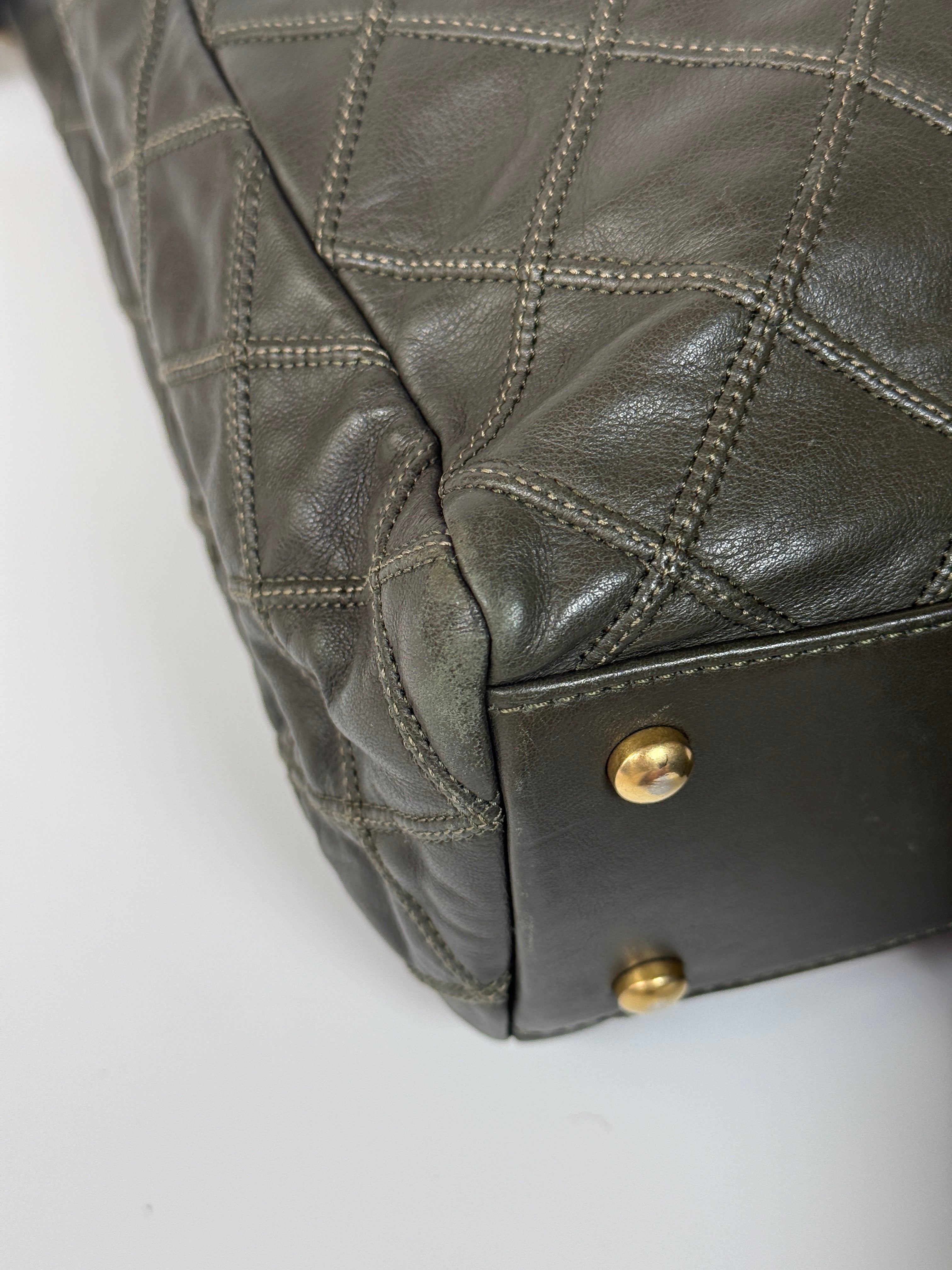 Authentic and preloved Chanel Dark Green Lambskin Leather Tote Bag With Gold Hardware very good condition. 100% Authenticity Guarantee