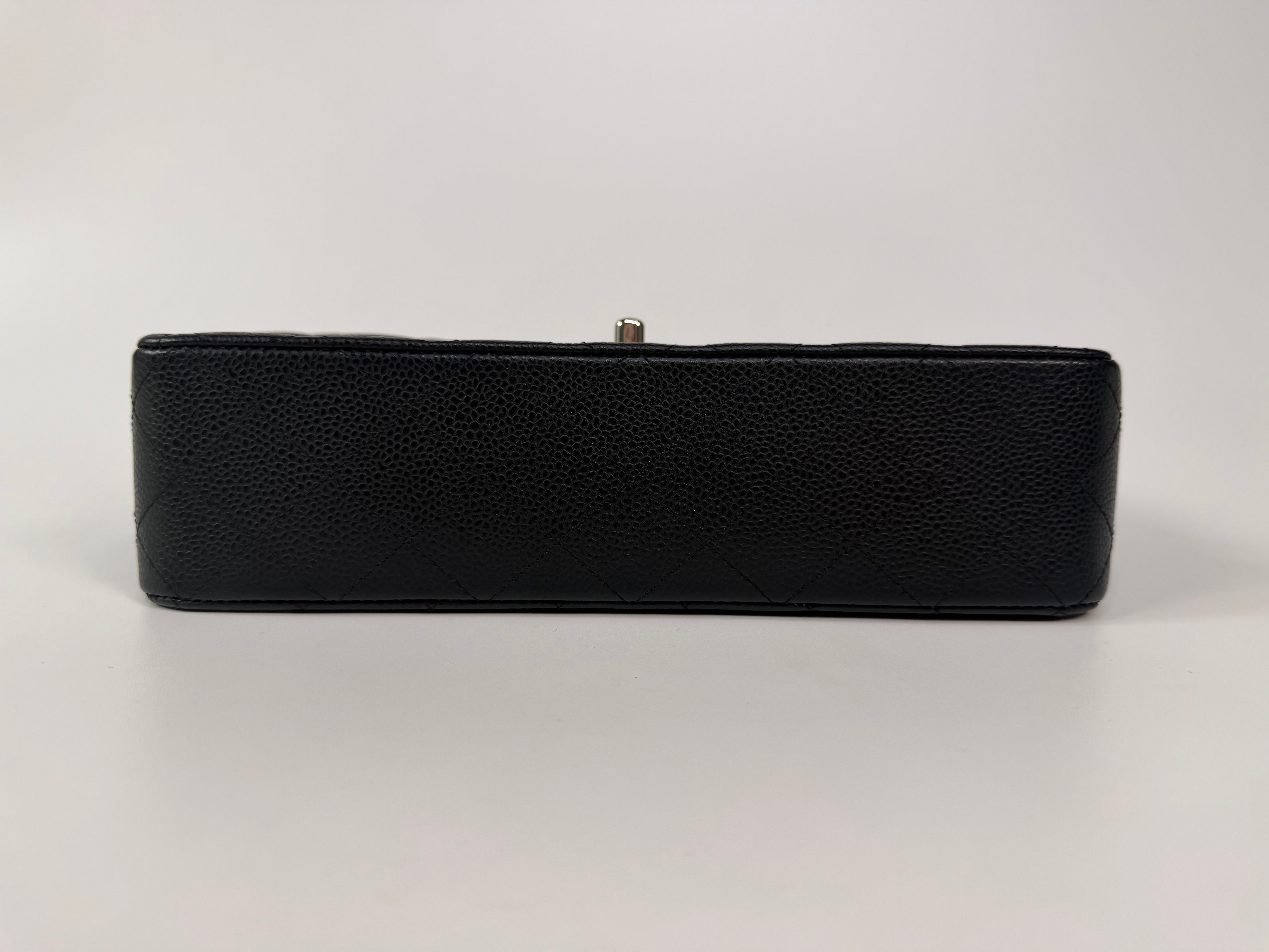 Chanel Vintage Medium Classic Double Flap Black Caviar Silver Hardware. 100% authentic and preloved in excellent condition