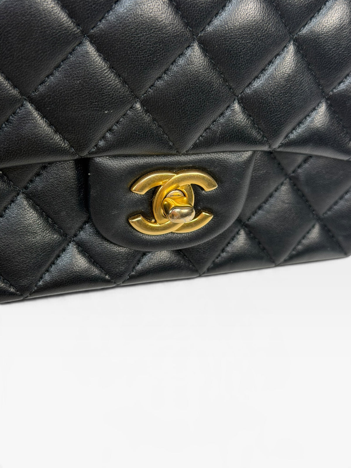 Chanel Mini Rectangle Top Handle In Black Lambskin With Gold Hardware. 100% authentic and pre loved in excellent condition.