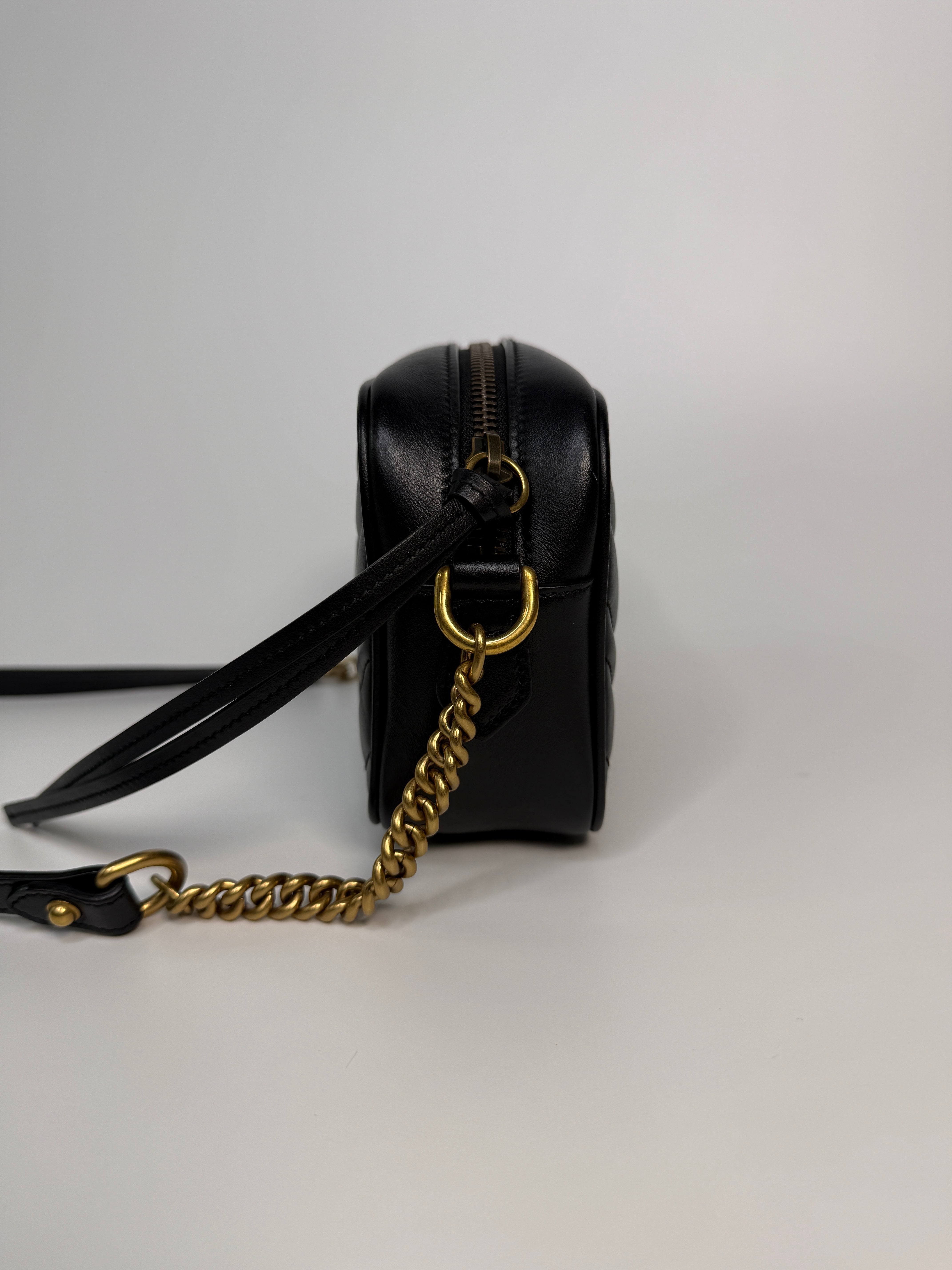 Gucci Small Marmont Camera Bag In Black Leather With Gold Hardware In Excellent Condition.
Authentic Pre Loved Verified by Luxe Cheshire Trusted Designer resale