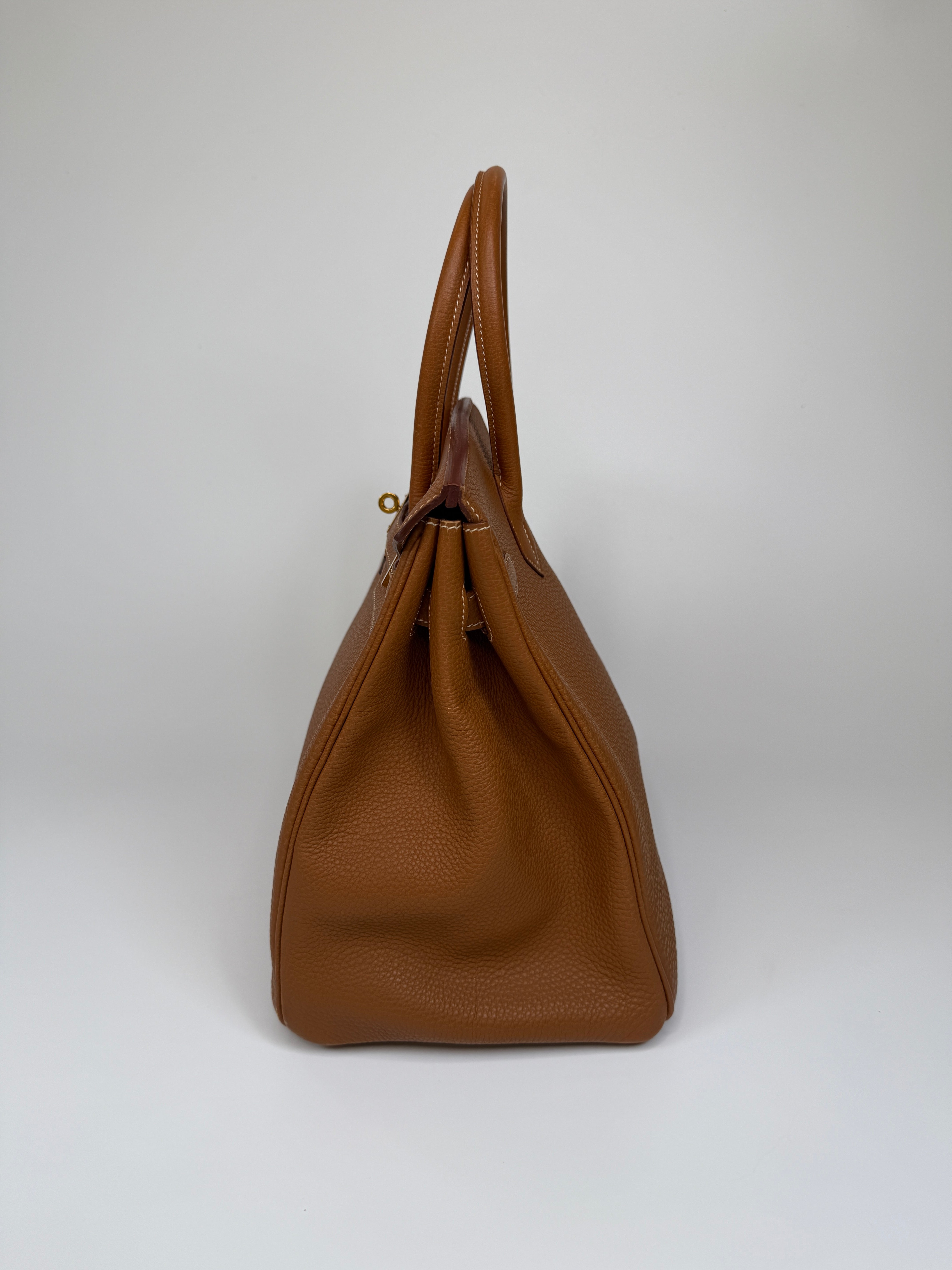 Authentic and preloved Hermès Birkin 35 In Gold Togo Leather With Gold Hardware. 100% Authenticity guarantee