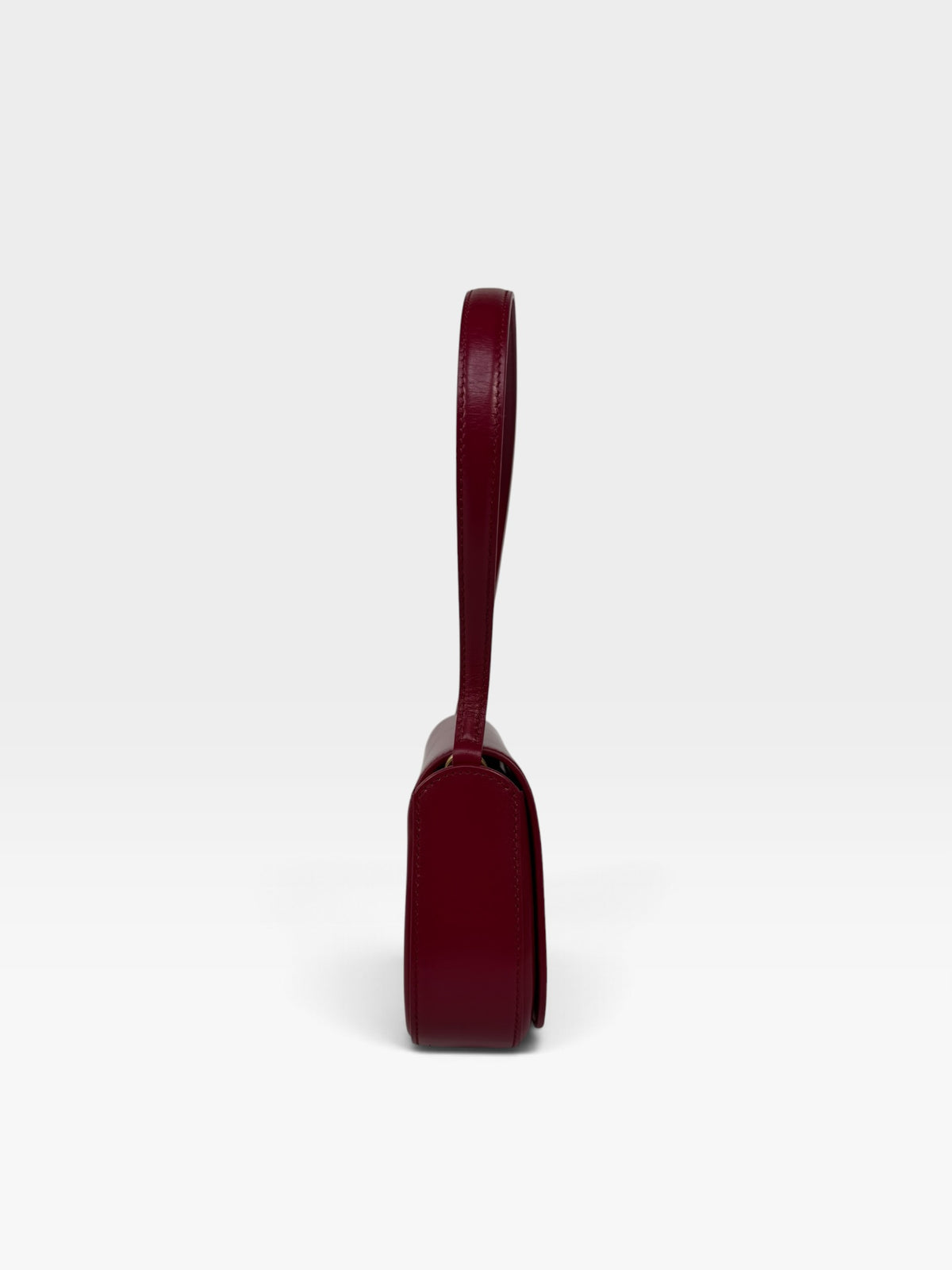 Saint Laurent Demi-Lune In Cherry Leather With Gold Hardware 100% authentic and preloved in excellent condition