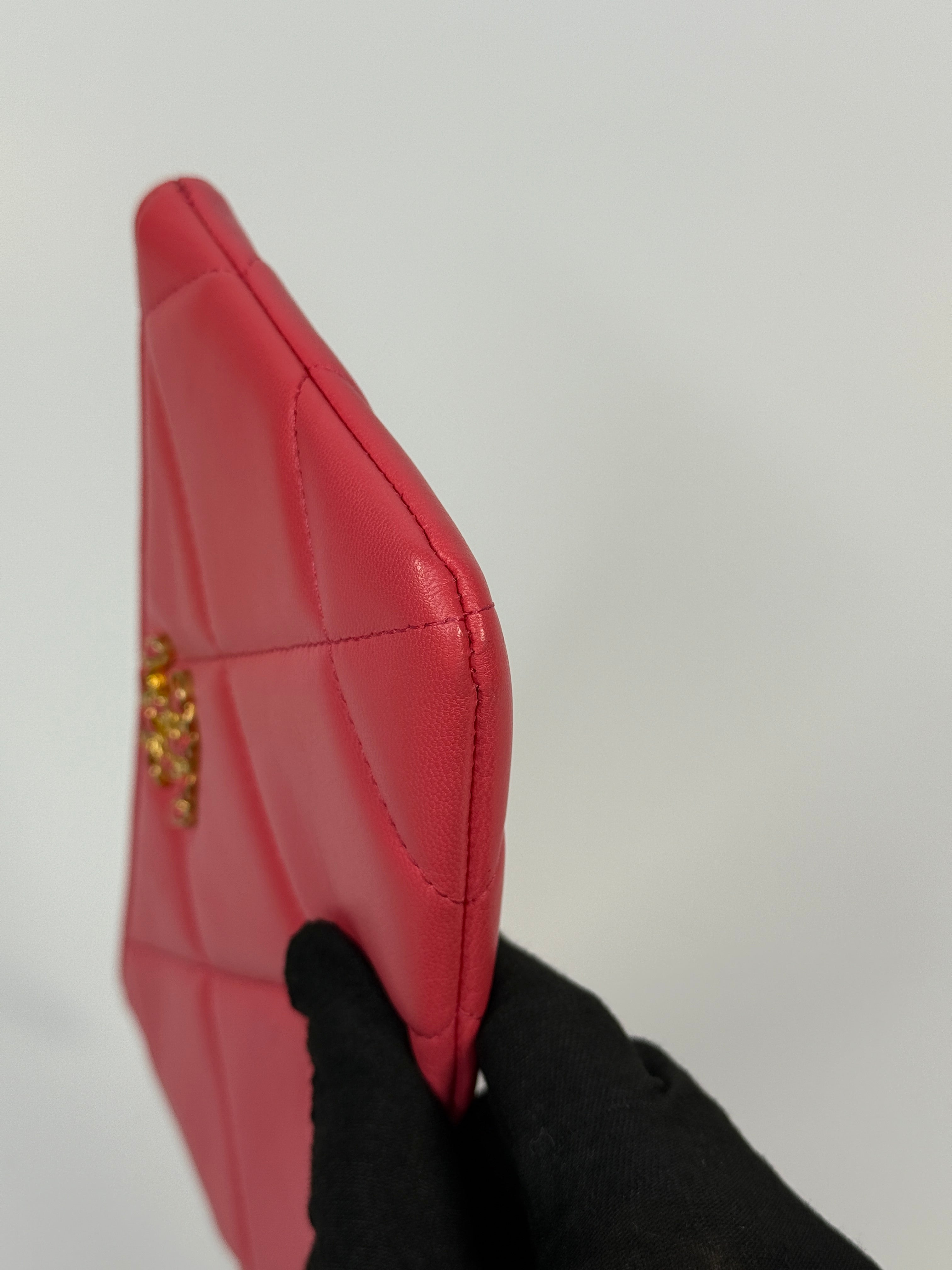 Chanel 19 Zip Pouch In Pink Calfskin Leather With Gold Hardware. Authentic preloved condition.