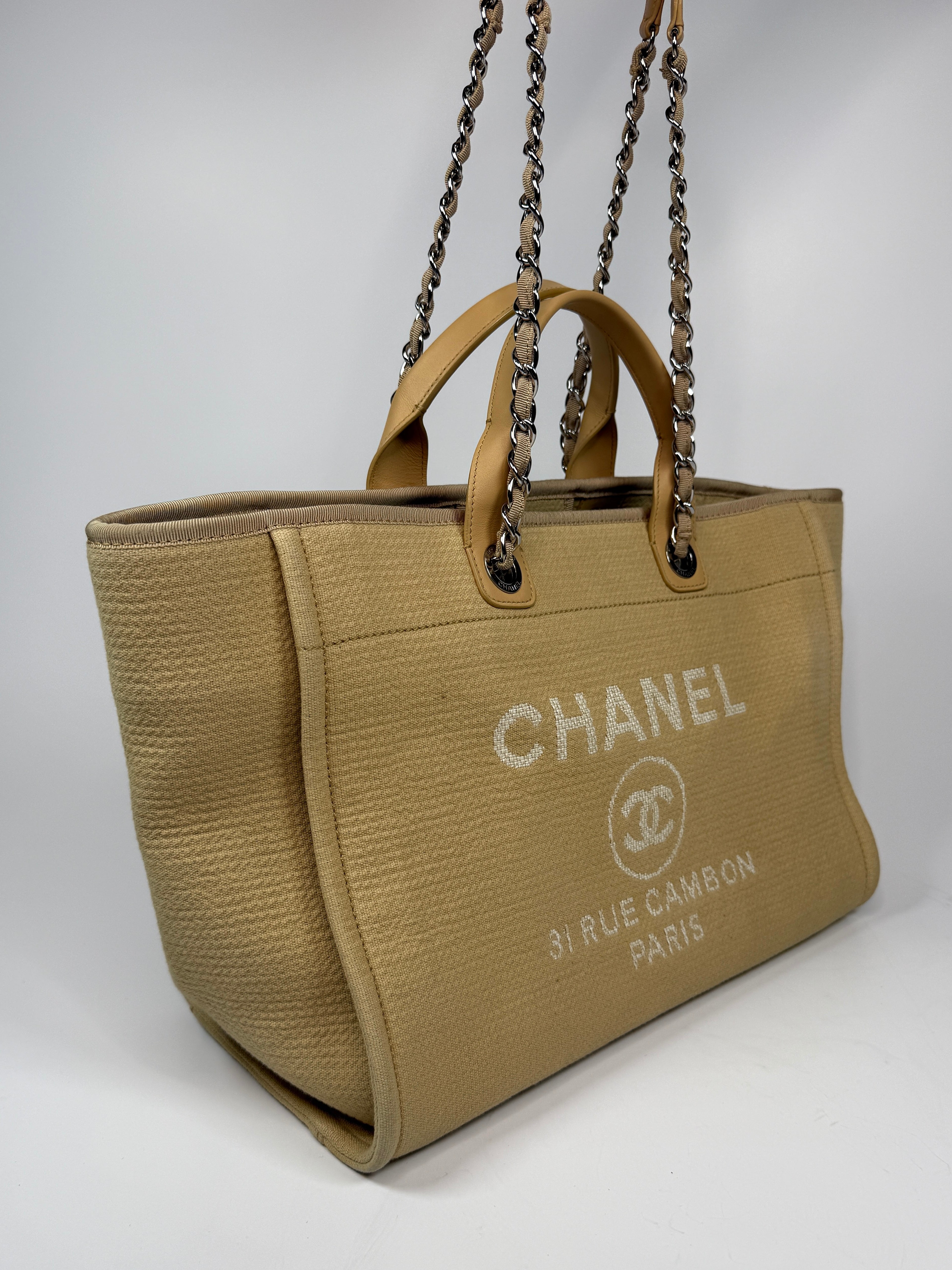 Chanel Large Deauville Tote Bag Large In Beige Fabric With Silver Hardware. Authentic and preloved In Very Good condition