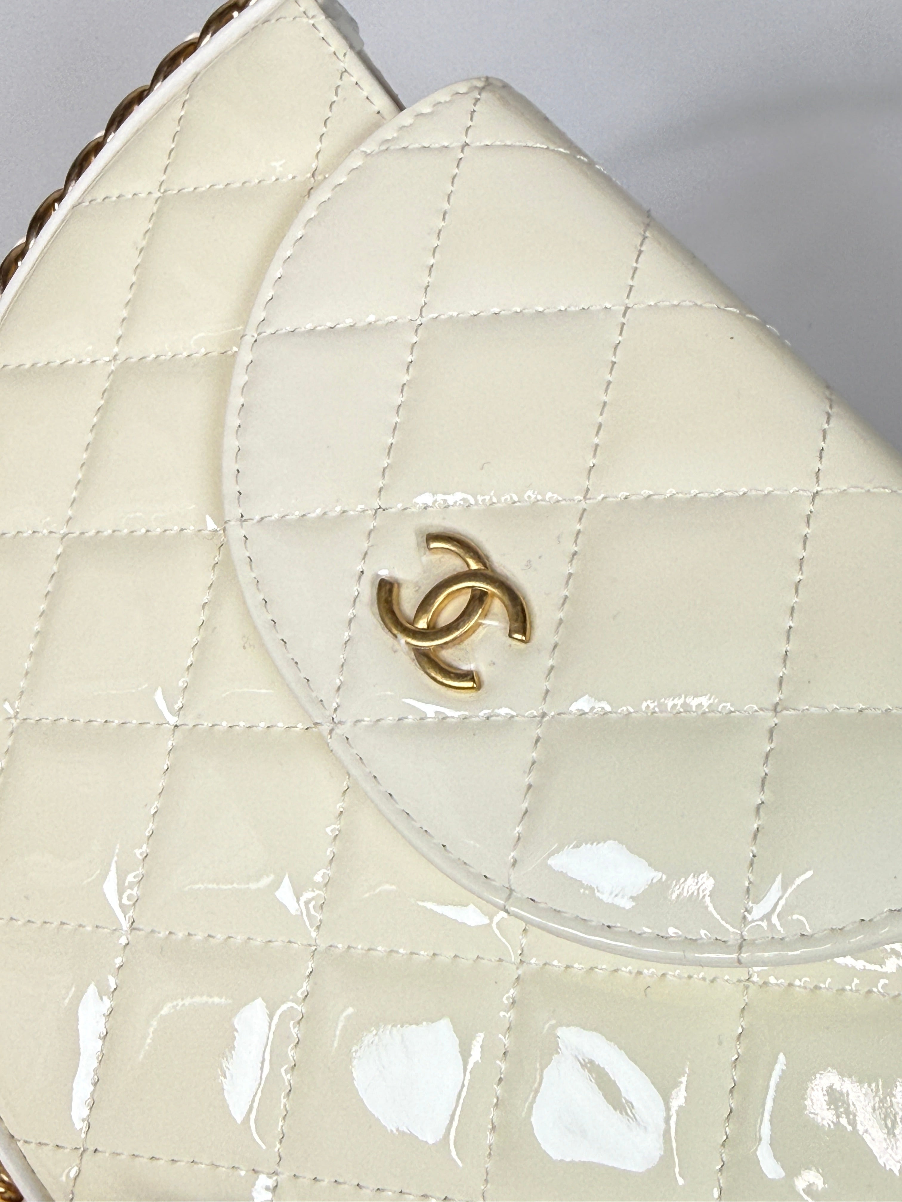Authentic and preloved Chanel White Quilted Patent Leather Chain Around Hoop Bag In Excellent condition. 100% Authenticity Guarantee