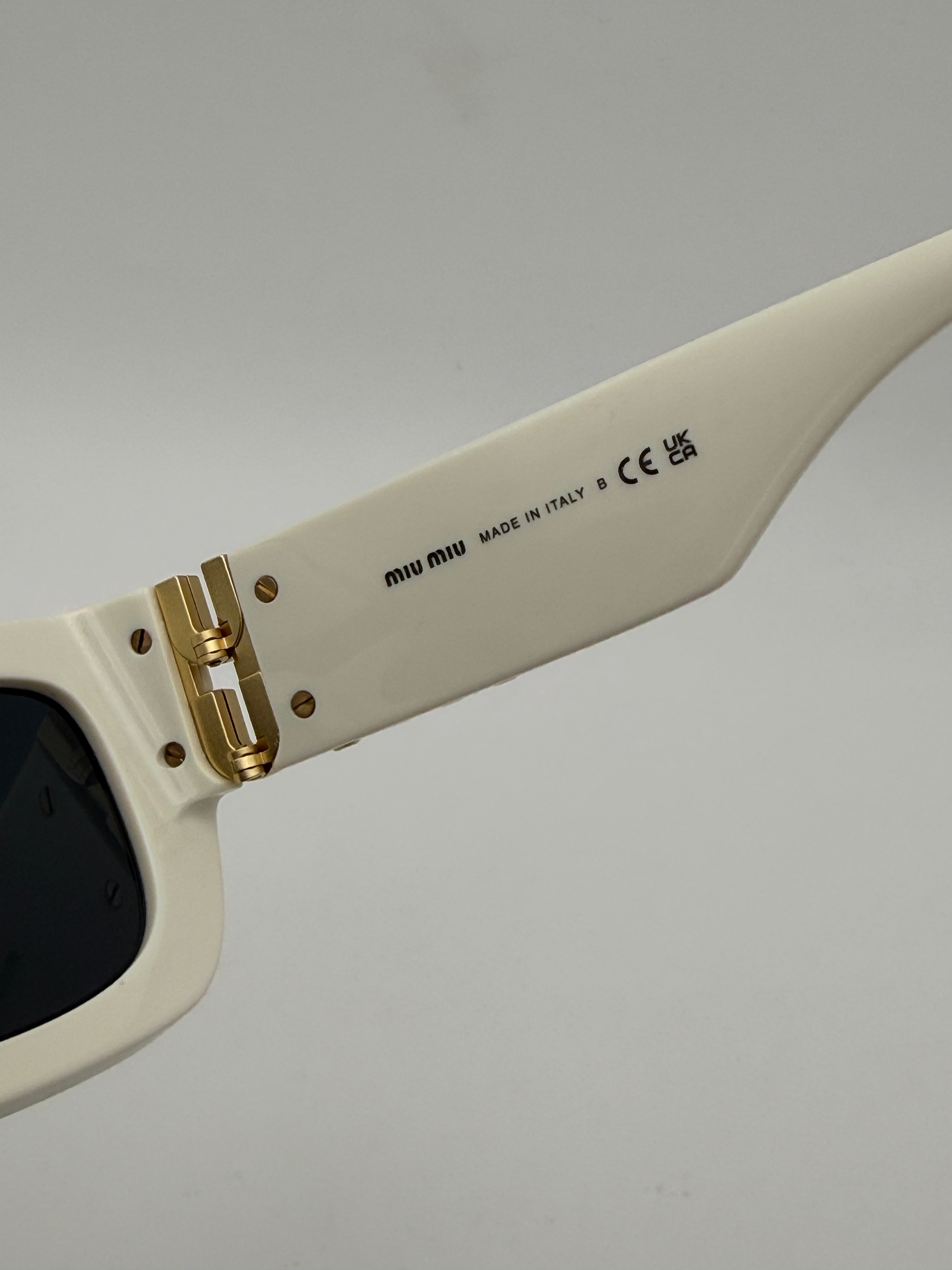 MiuMiu White logo sunglasses, Authentic and preloved. 100% Authenticity guarantee