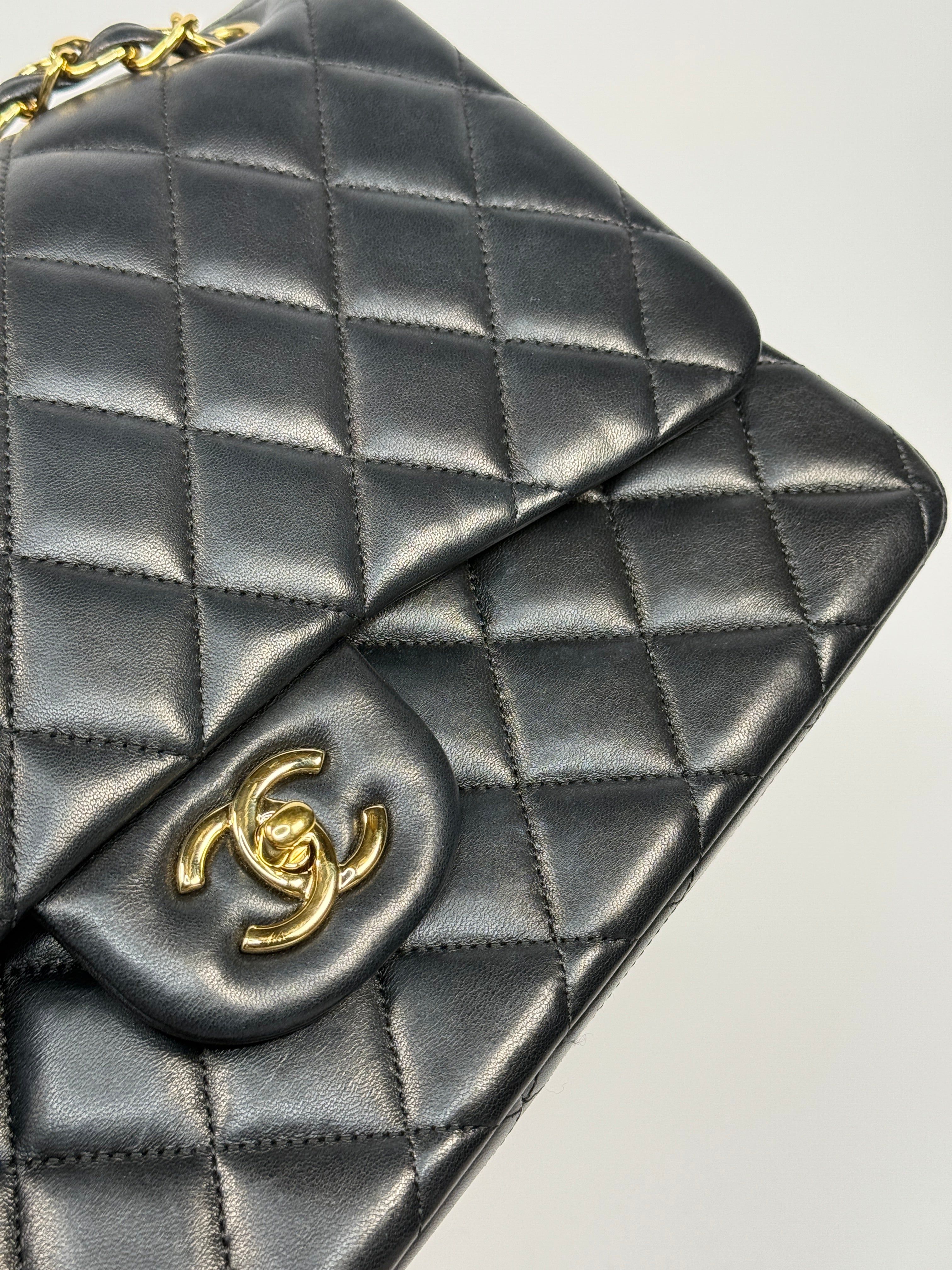 Chanel Jumbo Classic Flap Bag In Black Lambskin Leather With Gold Hardware
Pre Loved & Authentic