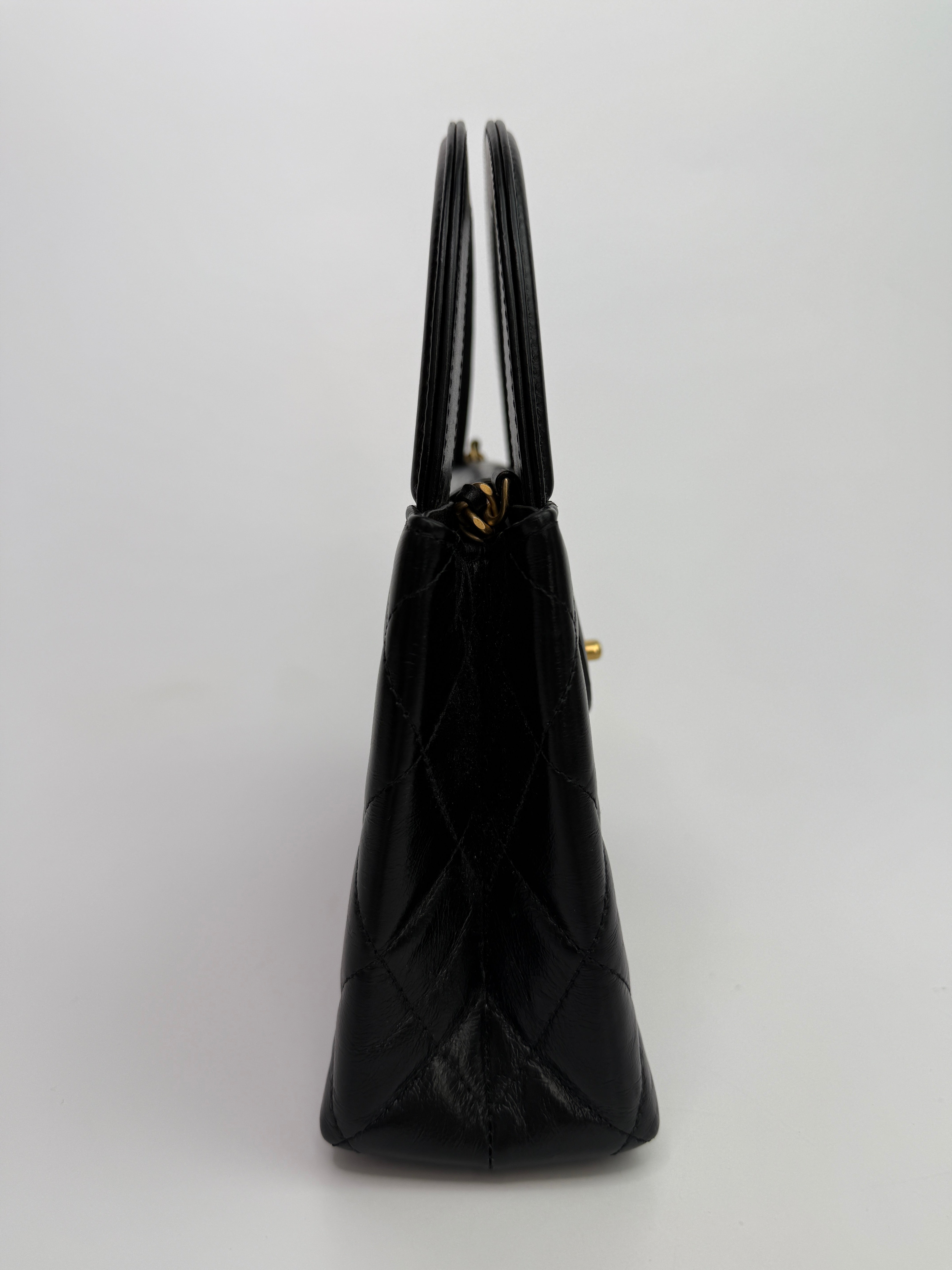 Chanel Mini Kelly Bag In Black Calfskin Leather with Gold Hardware
Pre Loved & Authentic