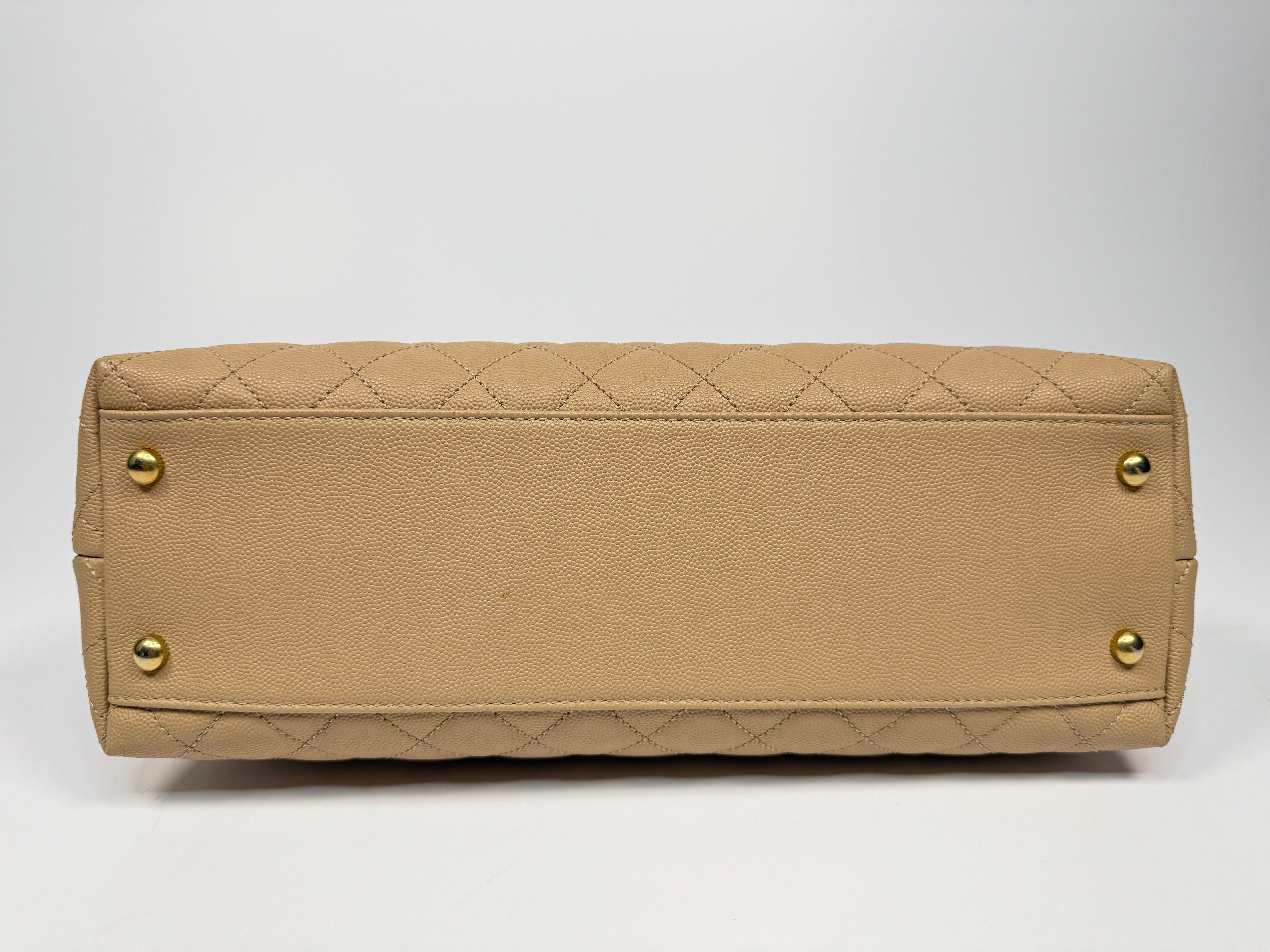 Chanel Coco Large Top Handle In Beige Caviar Leathe With Gold Hardware
Pre Loved & Authentic
