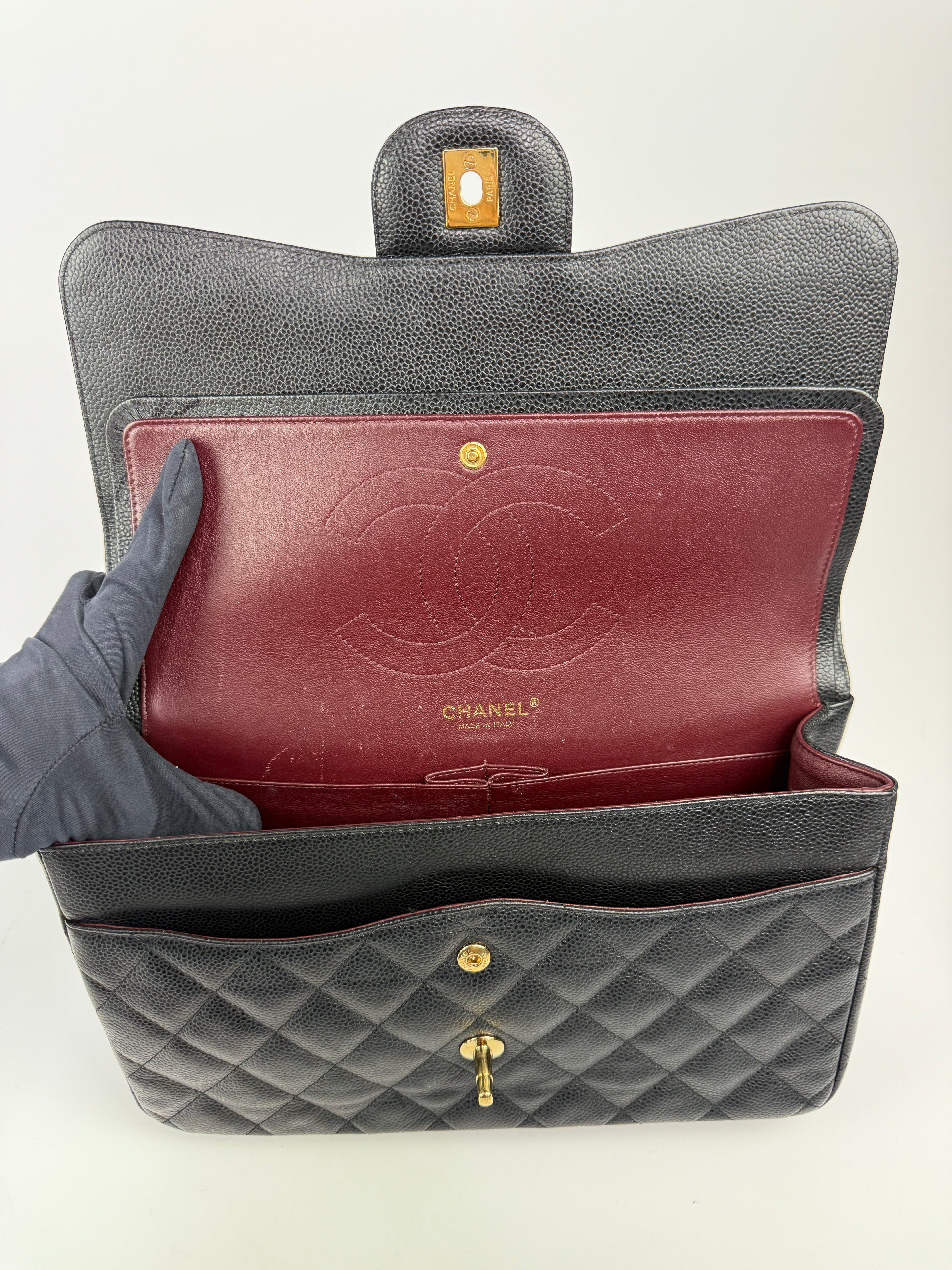 Chanel Jumbo Classic Double Flap In Black Caviar Gold Hardware
Pre Loved & Authentic