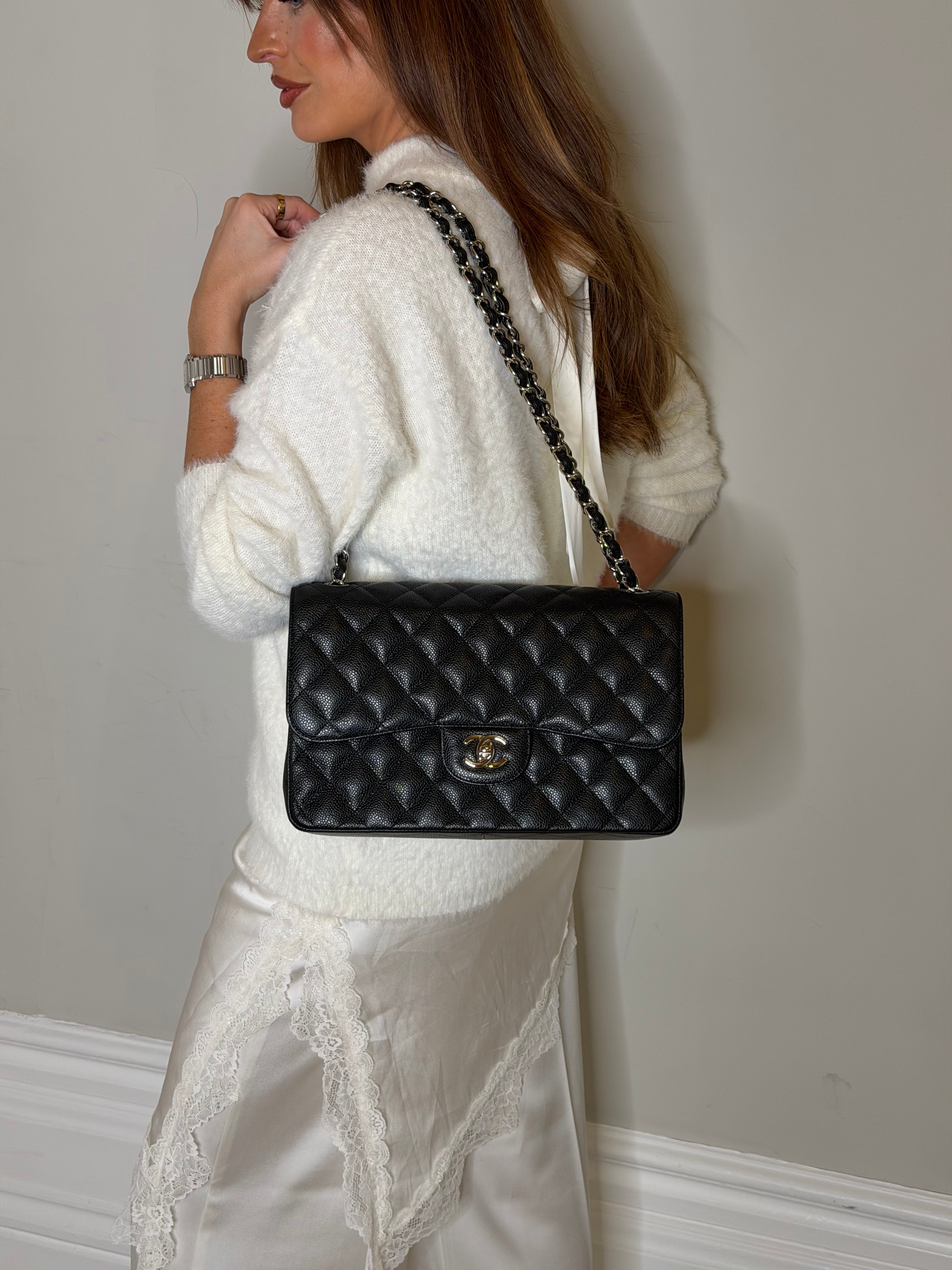 Chanel Classic Jumbo Flap Bag In Black Caviar Leather With Silver Hardware. Authentic and preloved. Excellent condition.