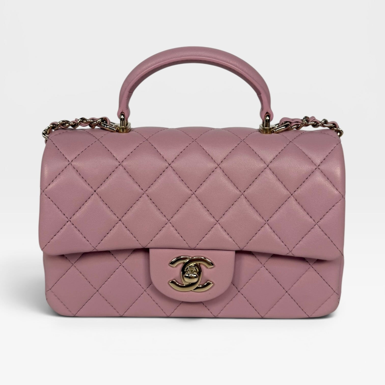 Chanel Mini Rectangle Top Handle In Pink Lambskin Leather With Pale Gold Hardware. 100% authentic and preloved in excellent condition