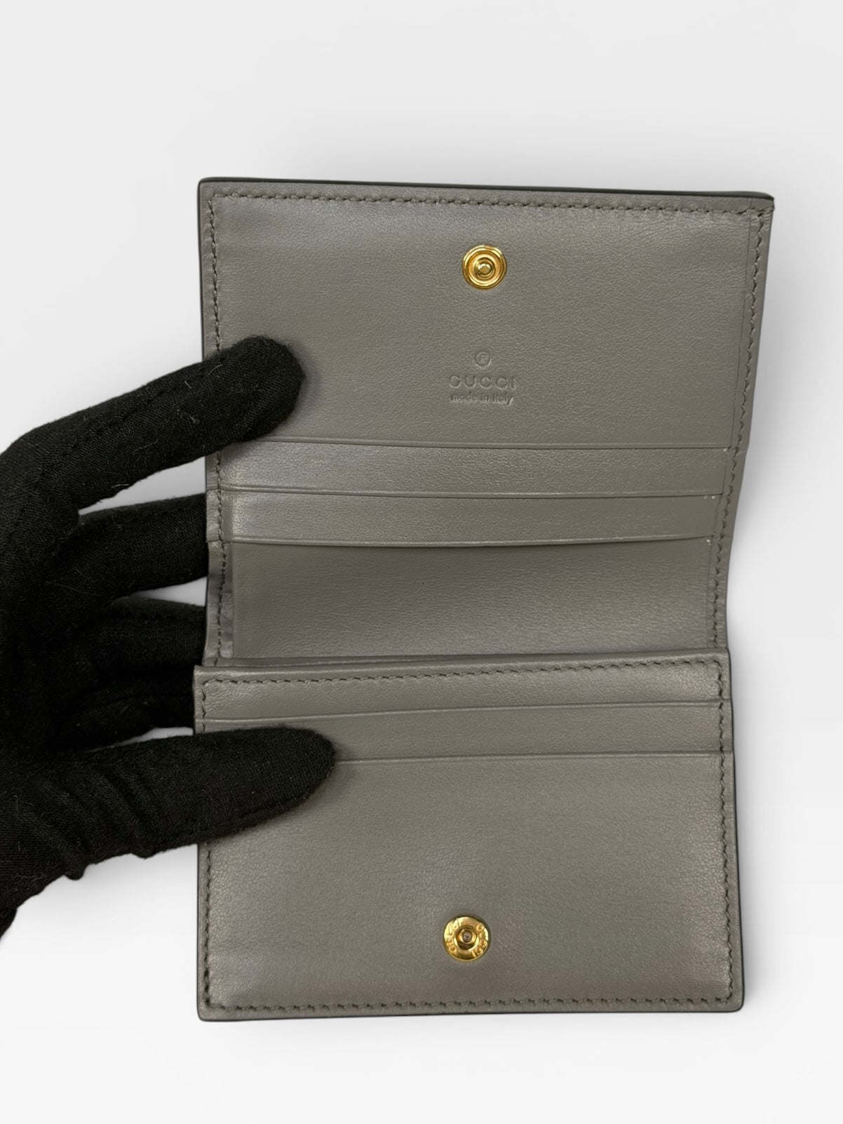 Gucci GG Embossed Wallet In Grey Leather With Gold Hardware. Authentic and preloved in excellent condition.