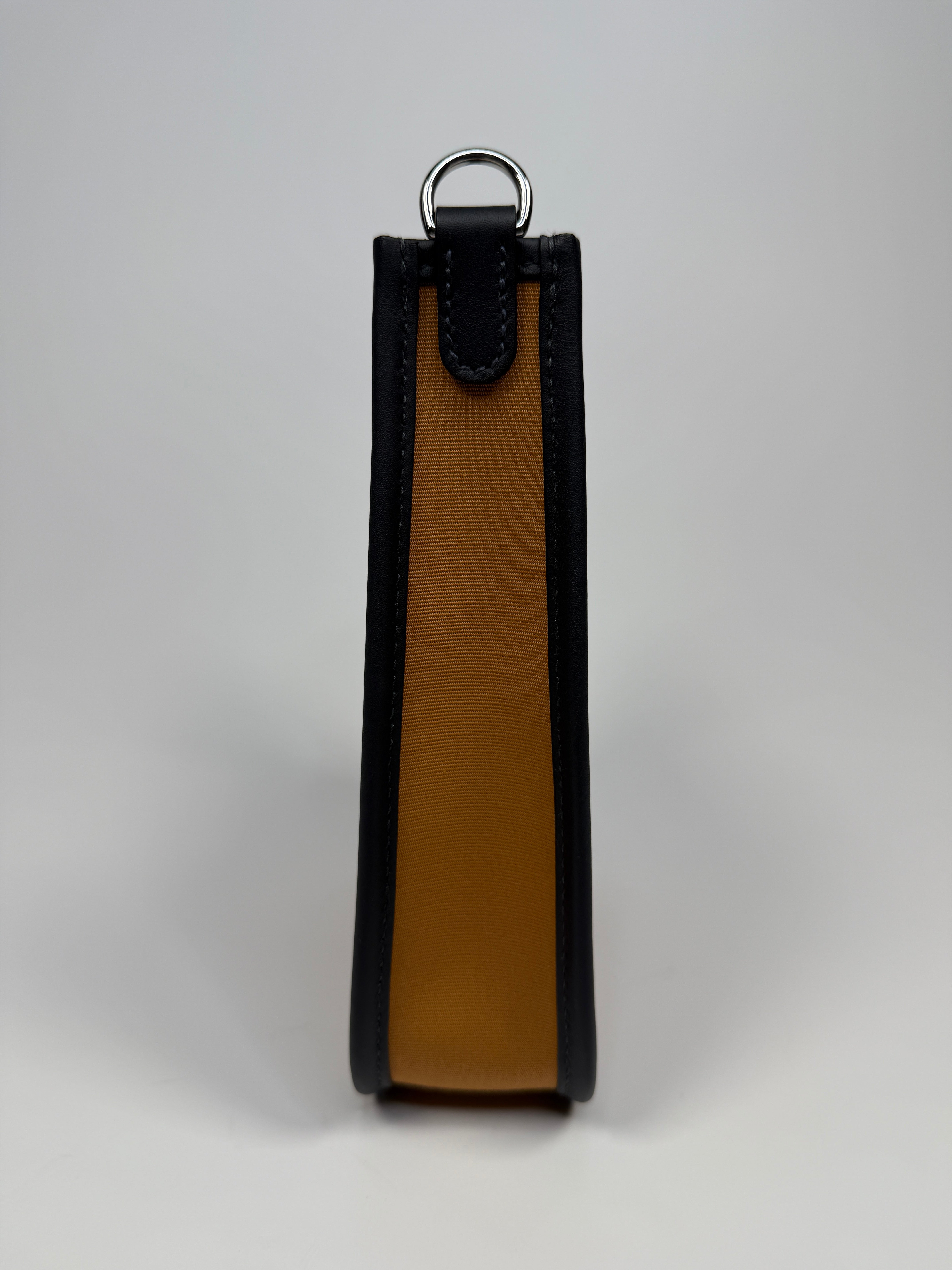 Hermès Evelyne TPM In Dune Cassis & Caban With Palladium hardware. Authentic and preloved. New condition.