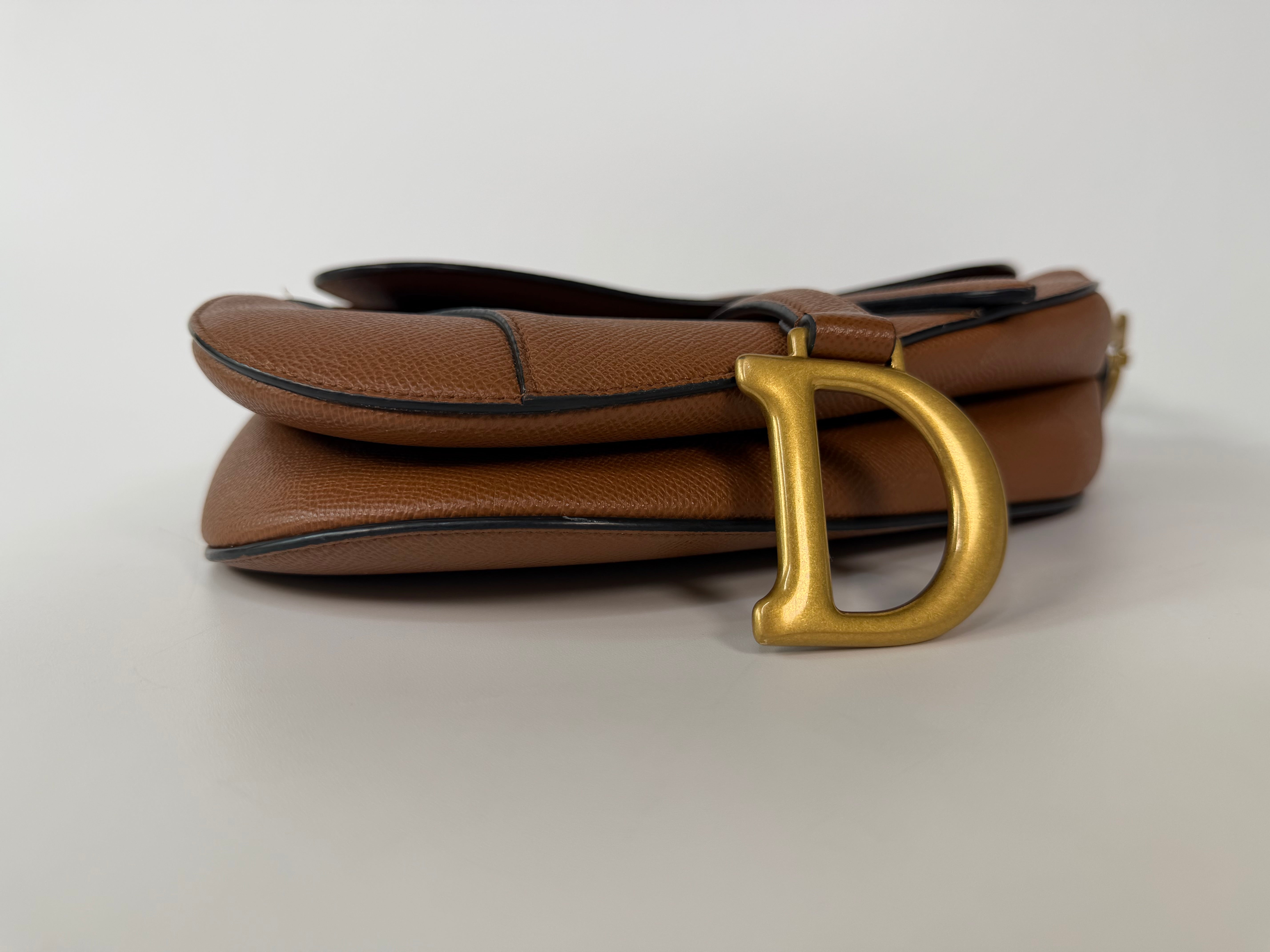 Christian Dior Saddle Bag In Golden Calfskin Gold Hardware. 100% authentic and preloved in excellent condition.