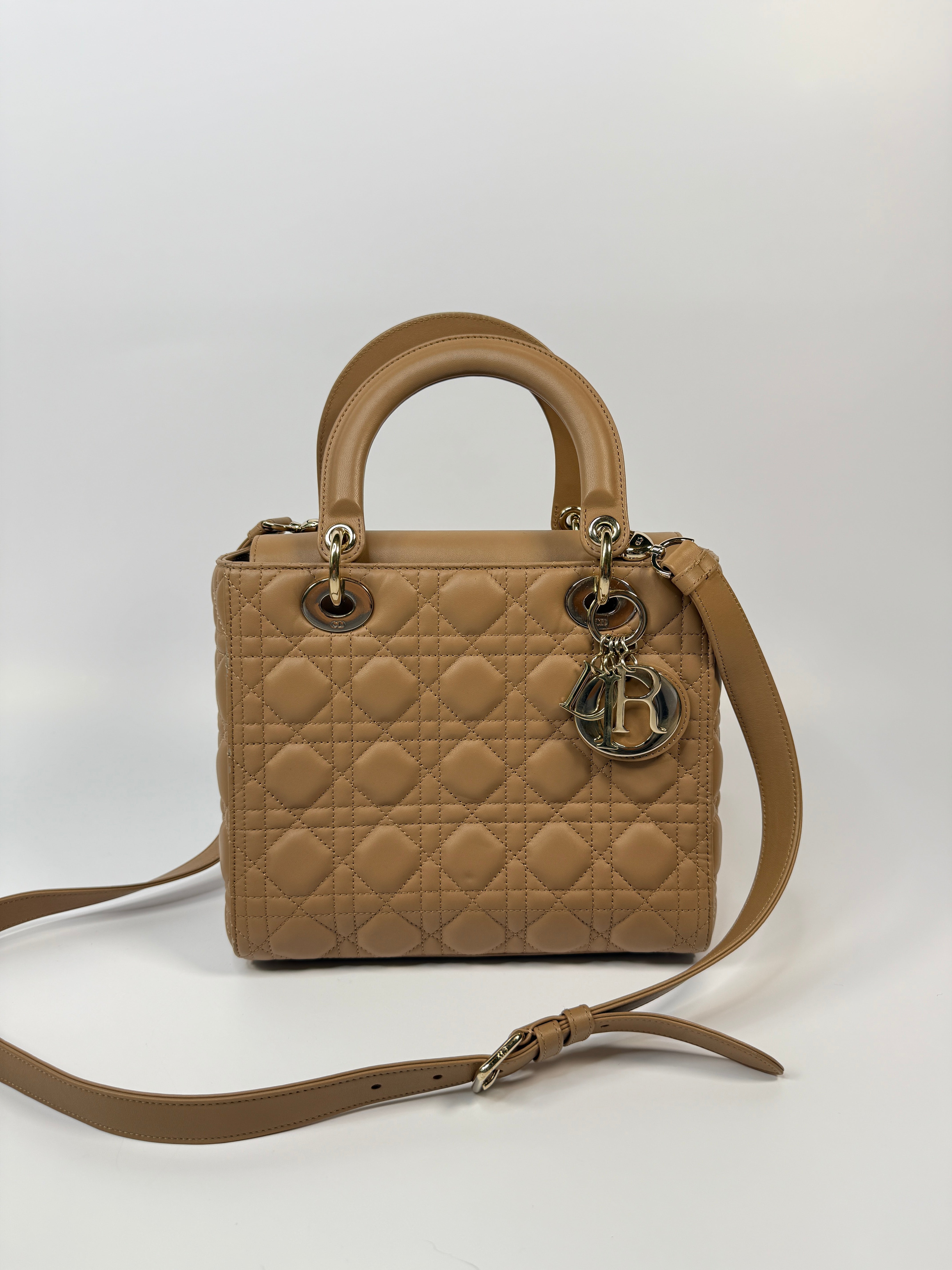 Authentic pre-loved Christian Dior Medium Lady Dior Bag in gold with gold hardware