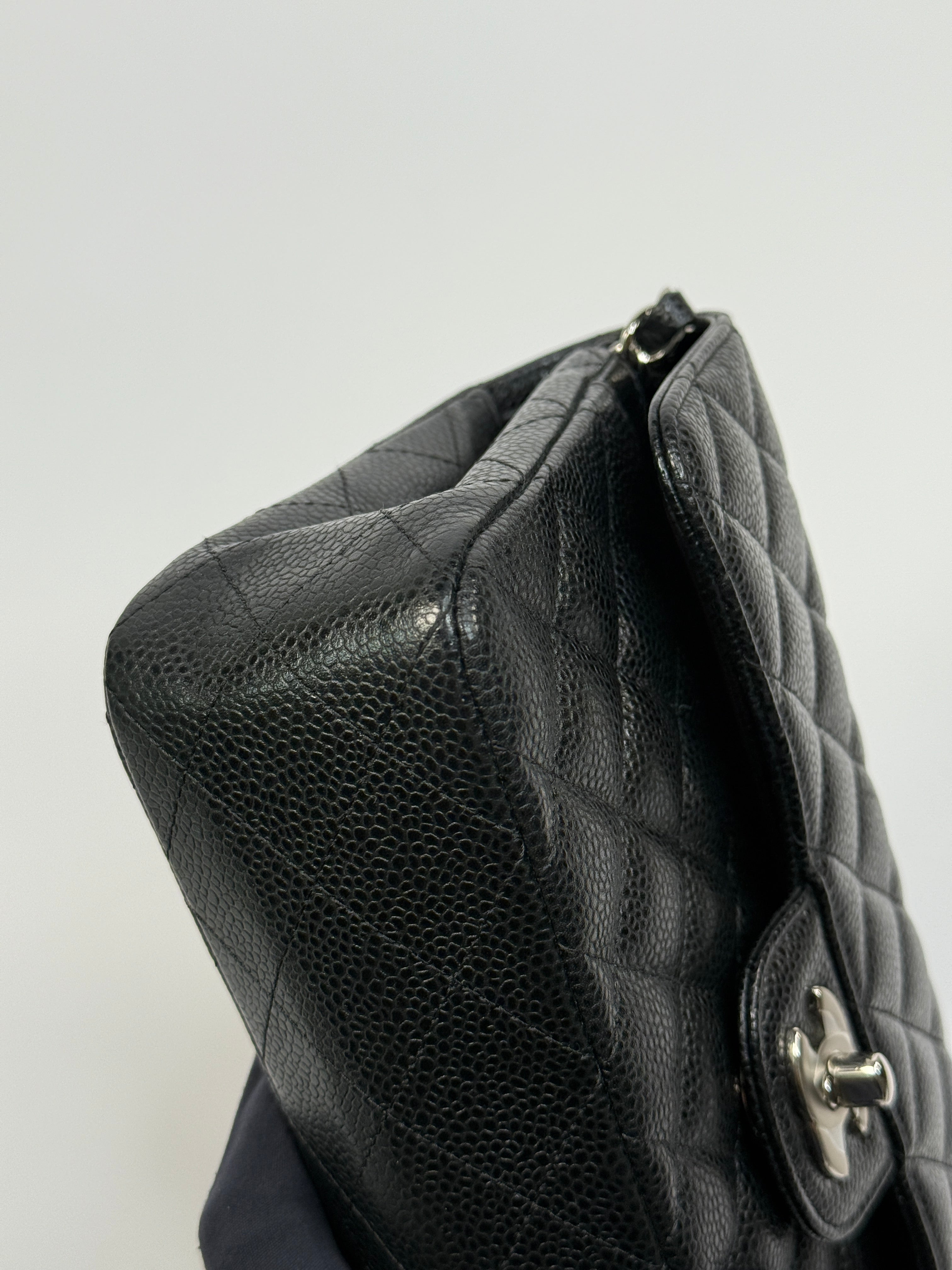 Chanel Small Classic Double Flap In Black Caviar Leather With Silver Hardware
Pre Loved & Authentic