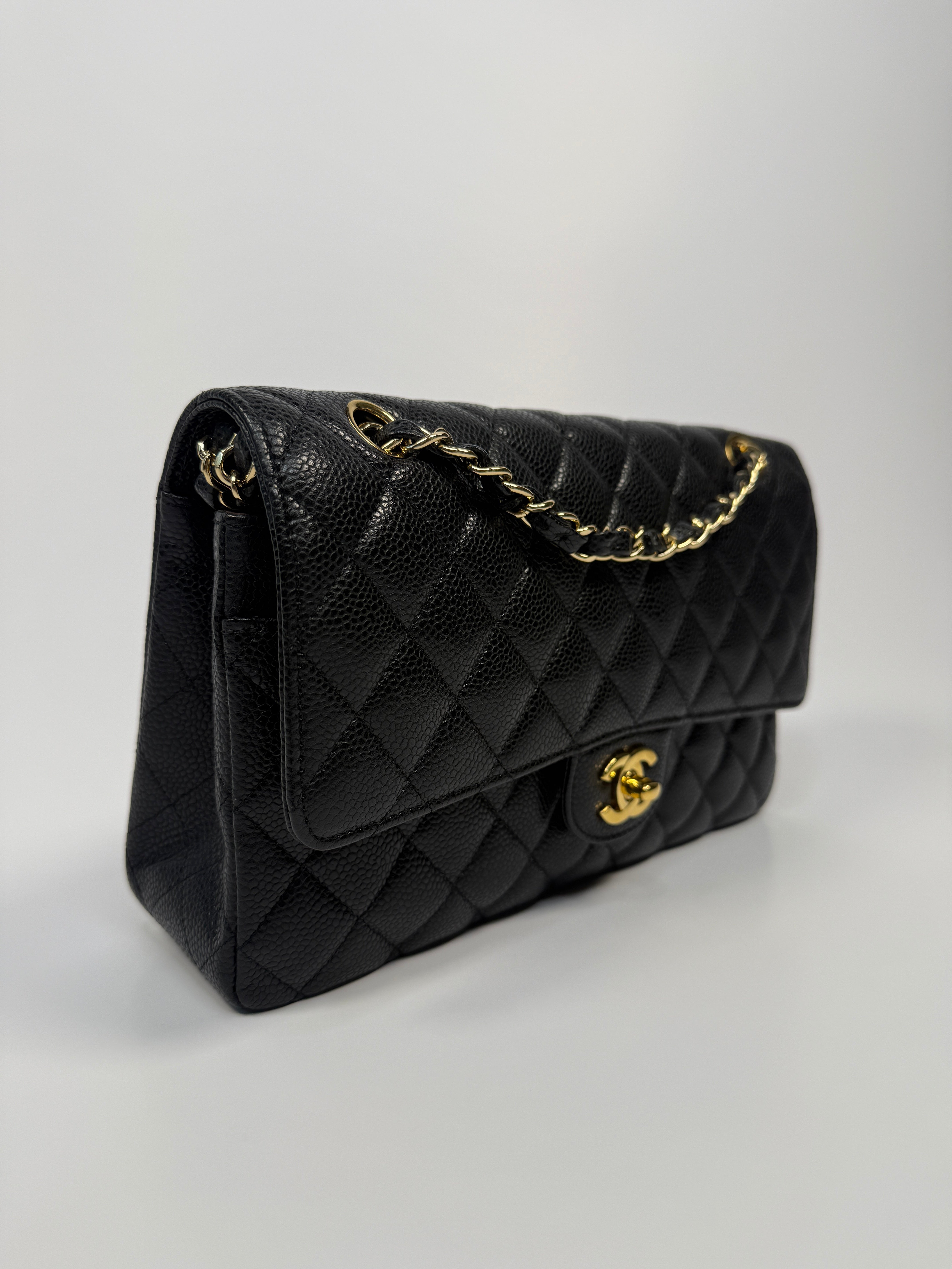 Chanel Medium Classic Double Flap Black CaviarWith Gold Hardware
Pre Loved & Authentic