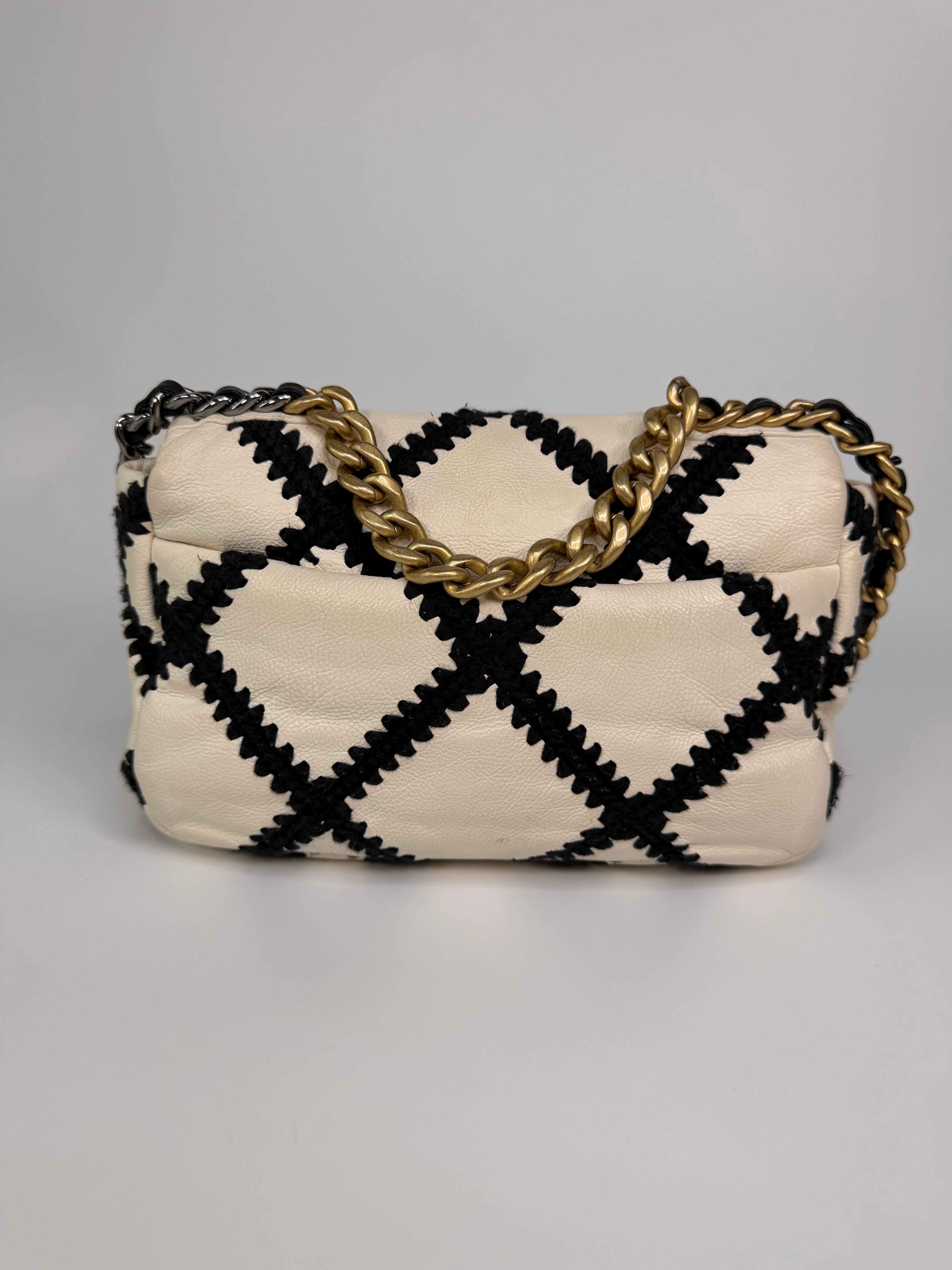 Chanel 19 Small In Black & White Leather With Mixed Hardware. Authentic and preloved in very good condition. 100% Guarantee