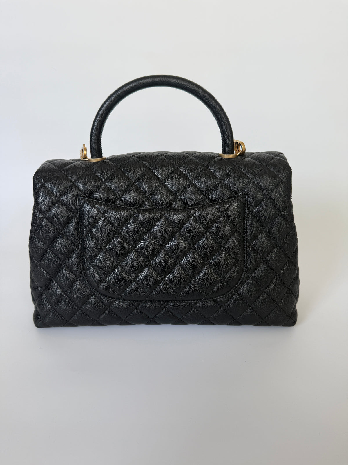 Chanel Coco Large Top Handle In Caviar Leather With Gold Hardware. Verified by Luxe Cheshire. Trusted designer resale.