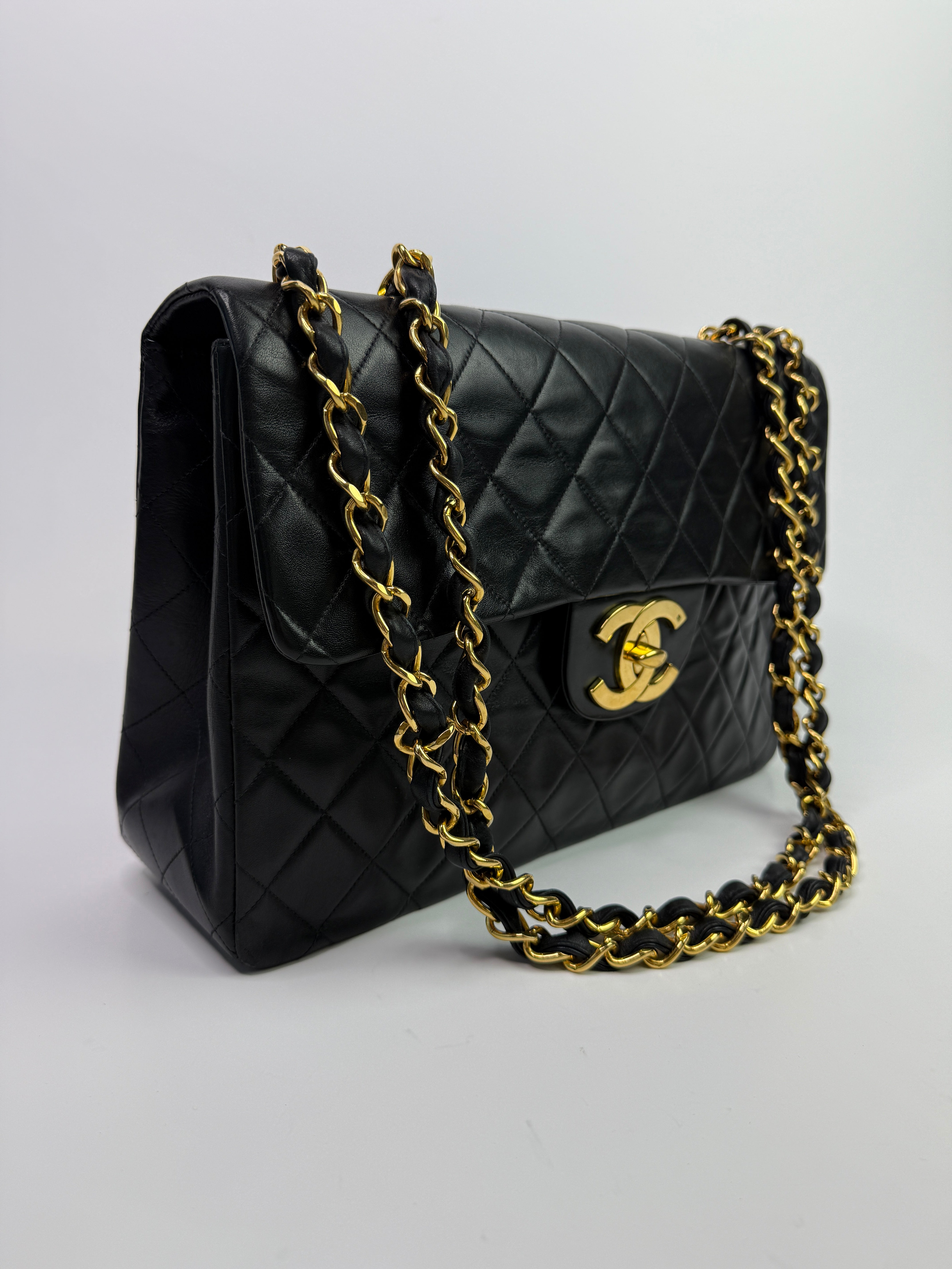 Chanel Vintage XL Maxi Flap Bag In Black Lambskin
