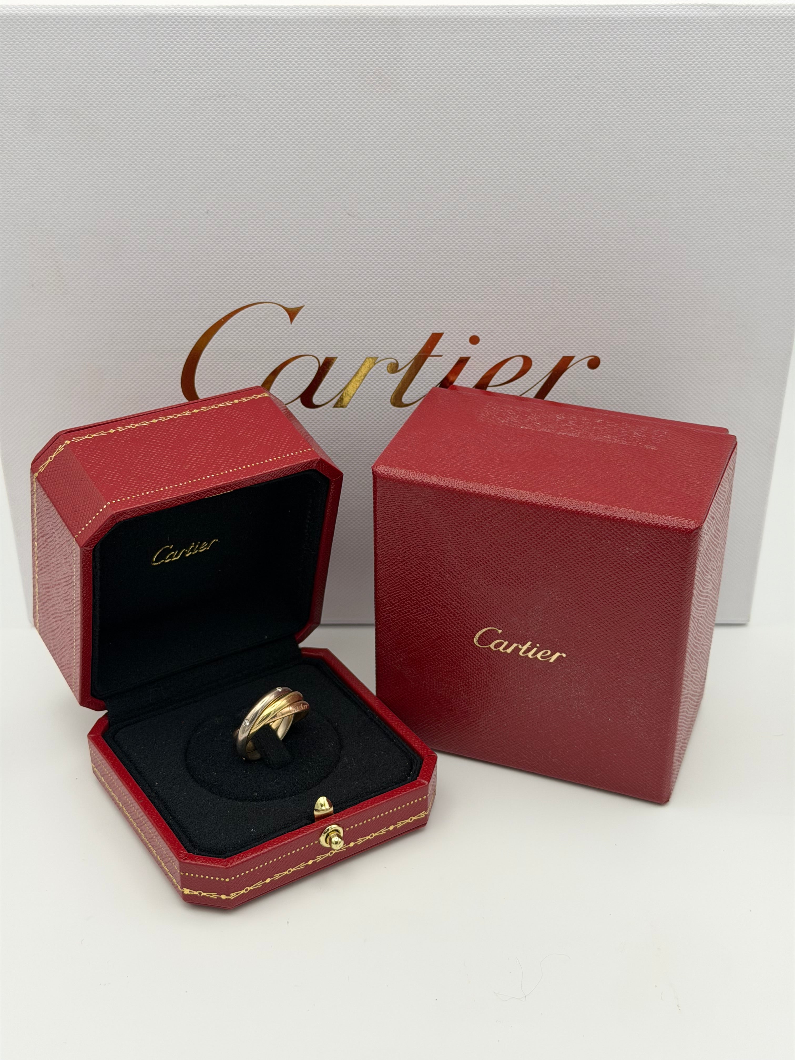 Cartier Trinity Ring Classic Model 5 Diamonds (Size 54). authentic and preloved in white gold, yellow gold and rose gold. very good condition