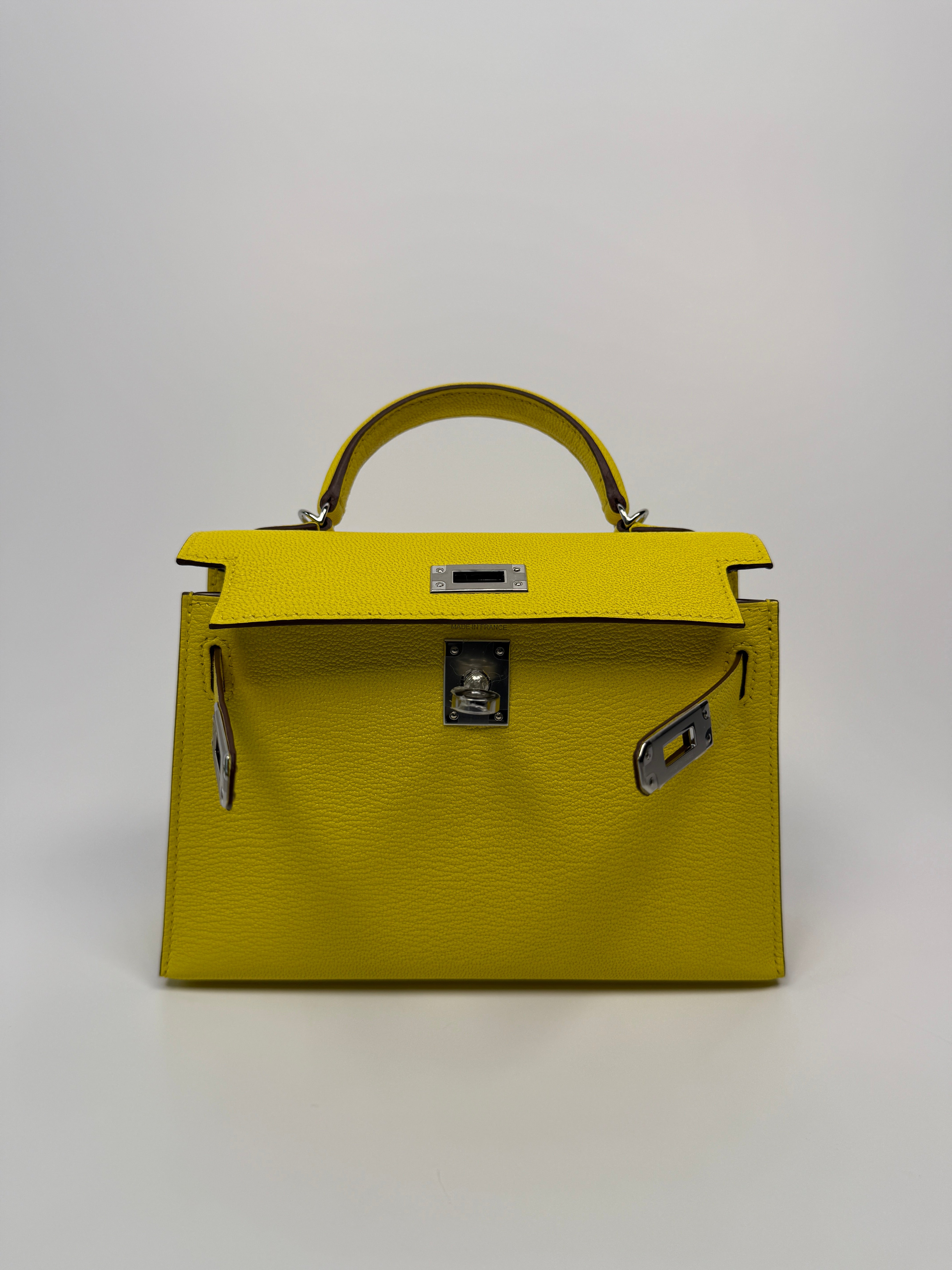 Authentic Pre Loved Hermés Mini Kelly ll Sellier Verso Chèvre Mysore in Jaune Citron and Mushroom With Palladium Hardware New & Unused Condition