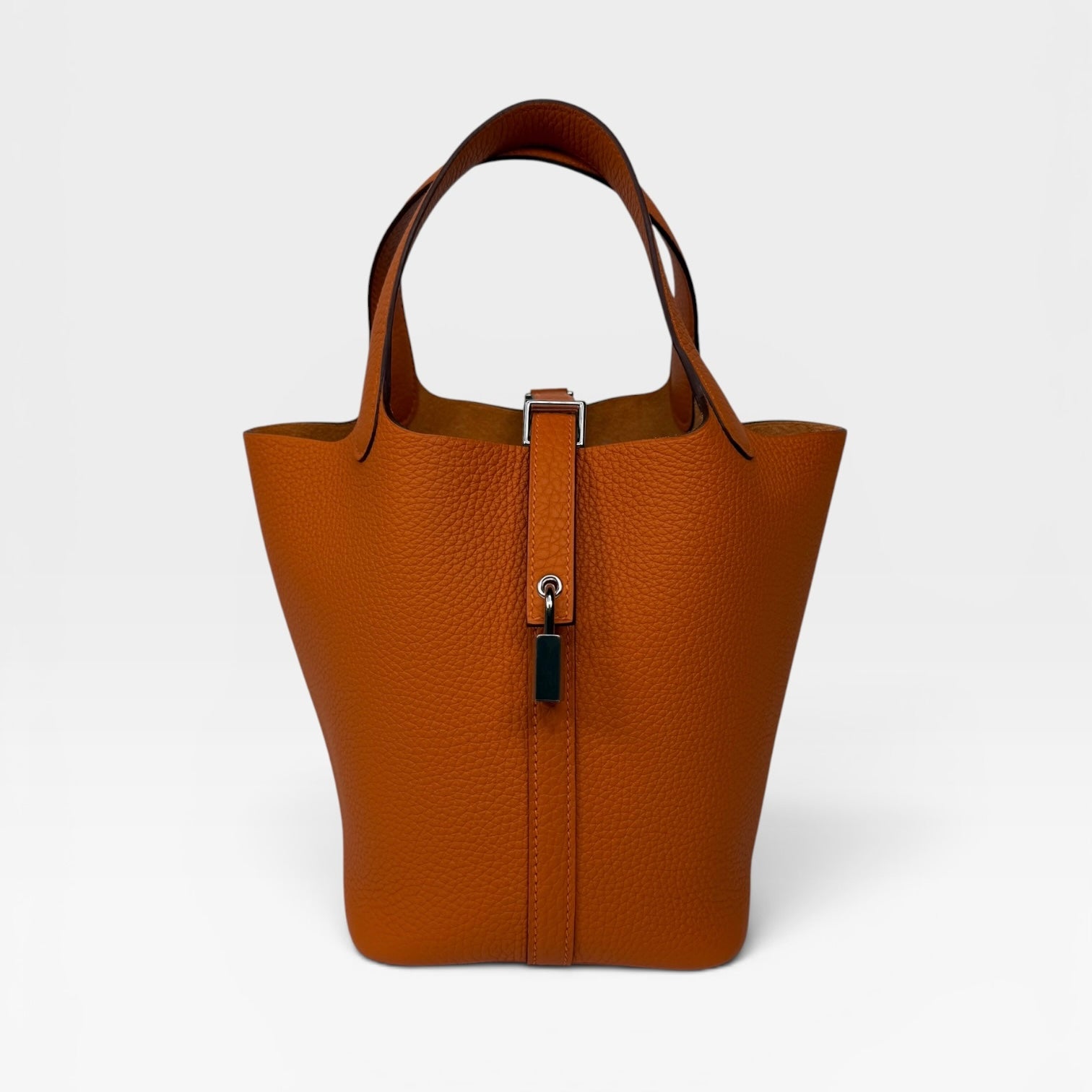 Hermès Picotin 18 In Orange Clemence Leather With Palladium Hardware
Authentic Pre Loved Verified by Luxe Cheshire Trusted Designer resale