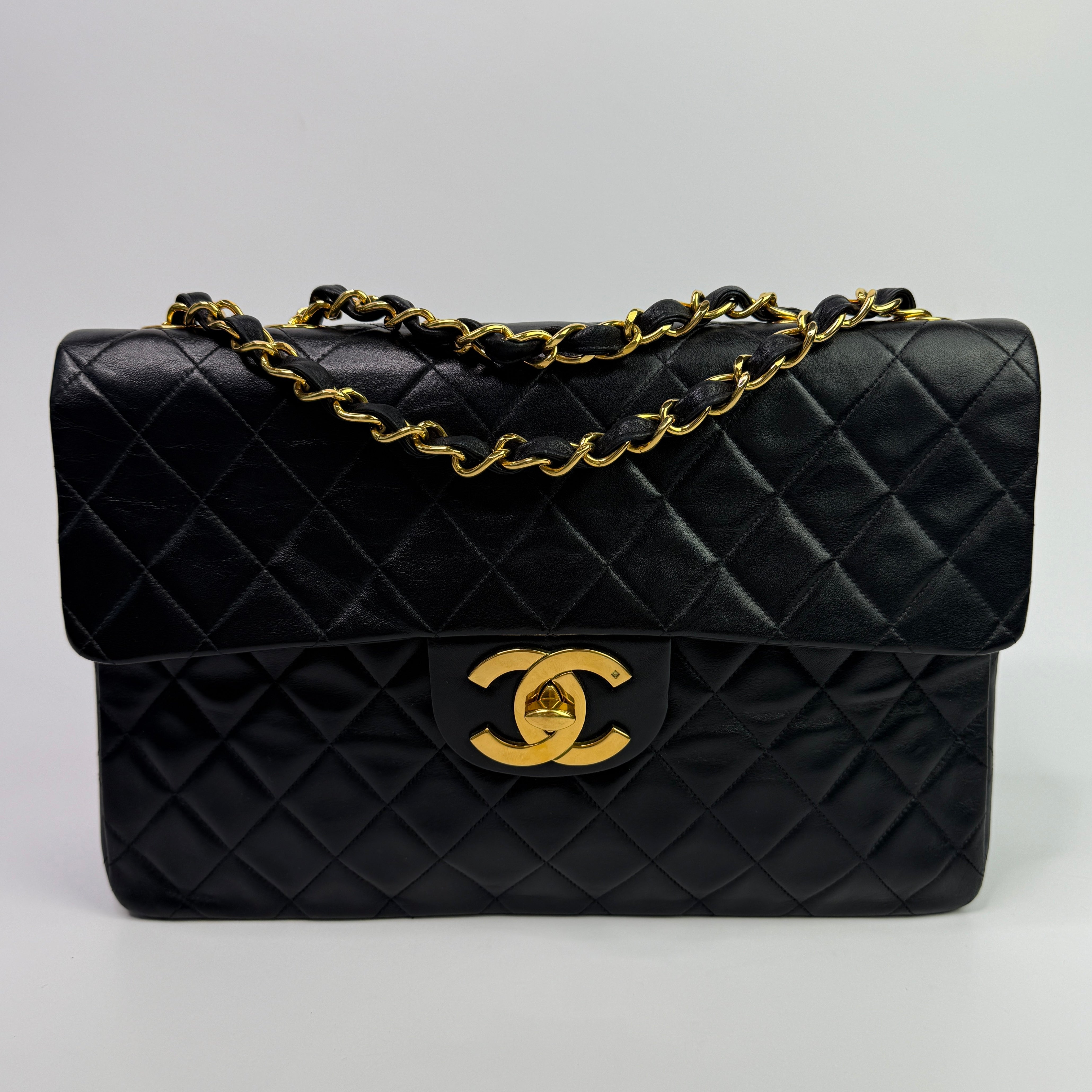 Chanel Vintage XL Maxi Flap Bag In Black Lambskin