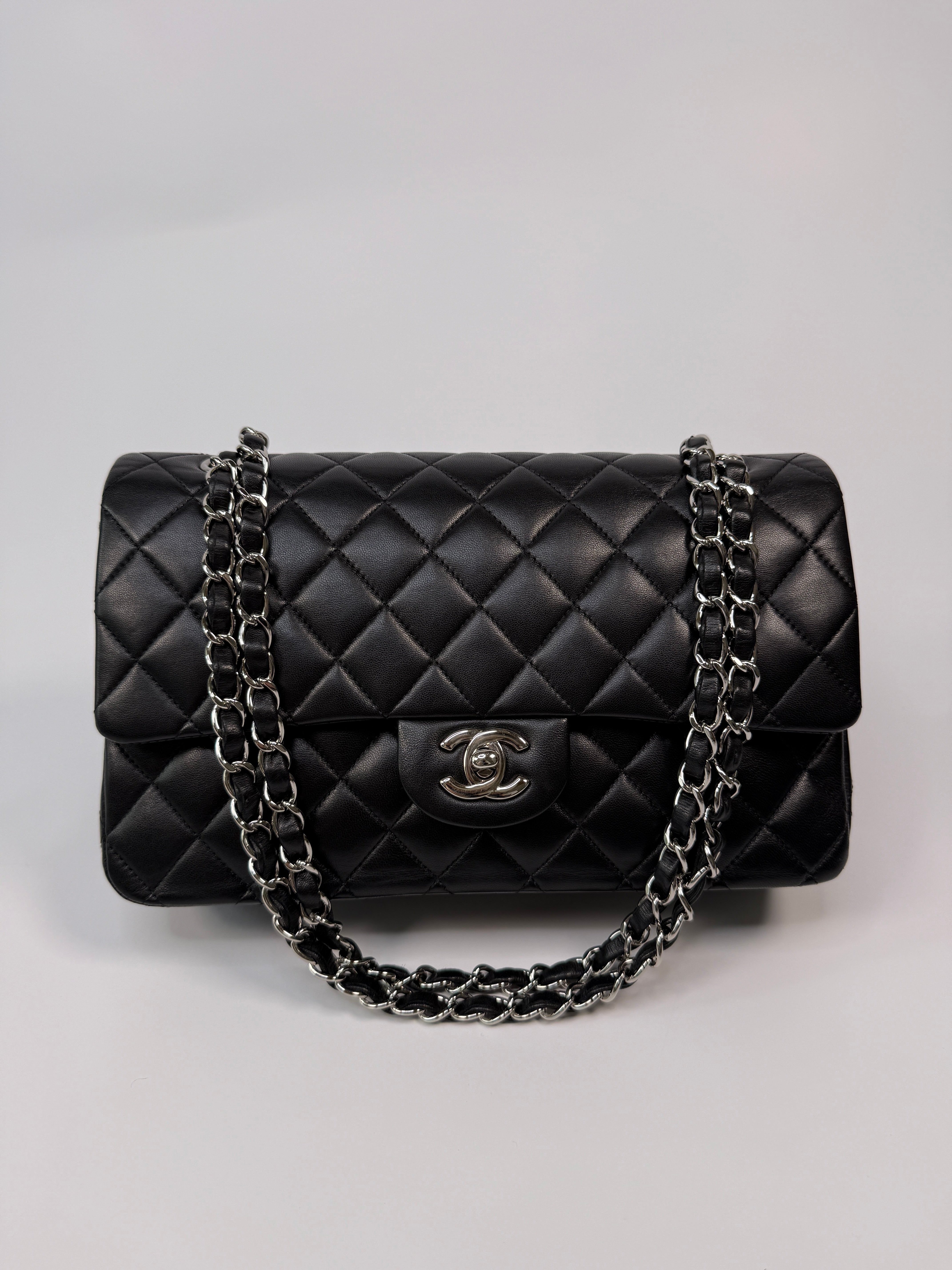 Chanel Medium Classic Double Flap Black Lambskin Leather With Silver Hardware
Pre Loved & Authentic