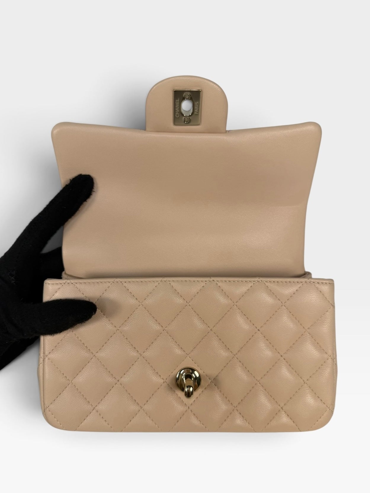 Chanel Mini Rectangle Top Handle Beige Lambskin Pale Gold Hardware. 100% authentic and preloved in excellent condition.
