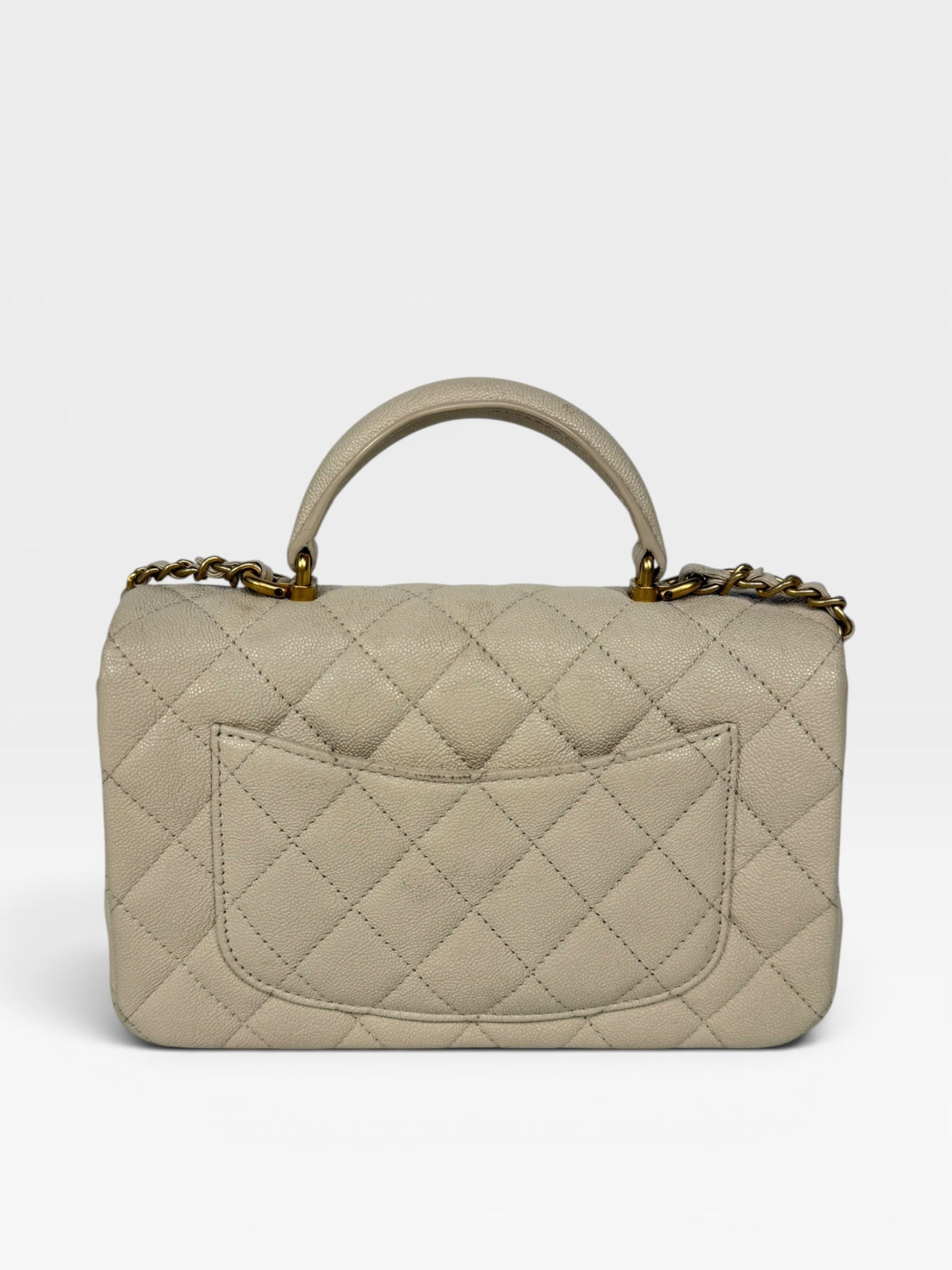 Chanel Mini Rectangle Top Handle In Cream Caviar Leather With Aged Gold Hardware. 100% authentic and preloved in excellent condition.