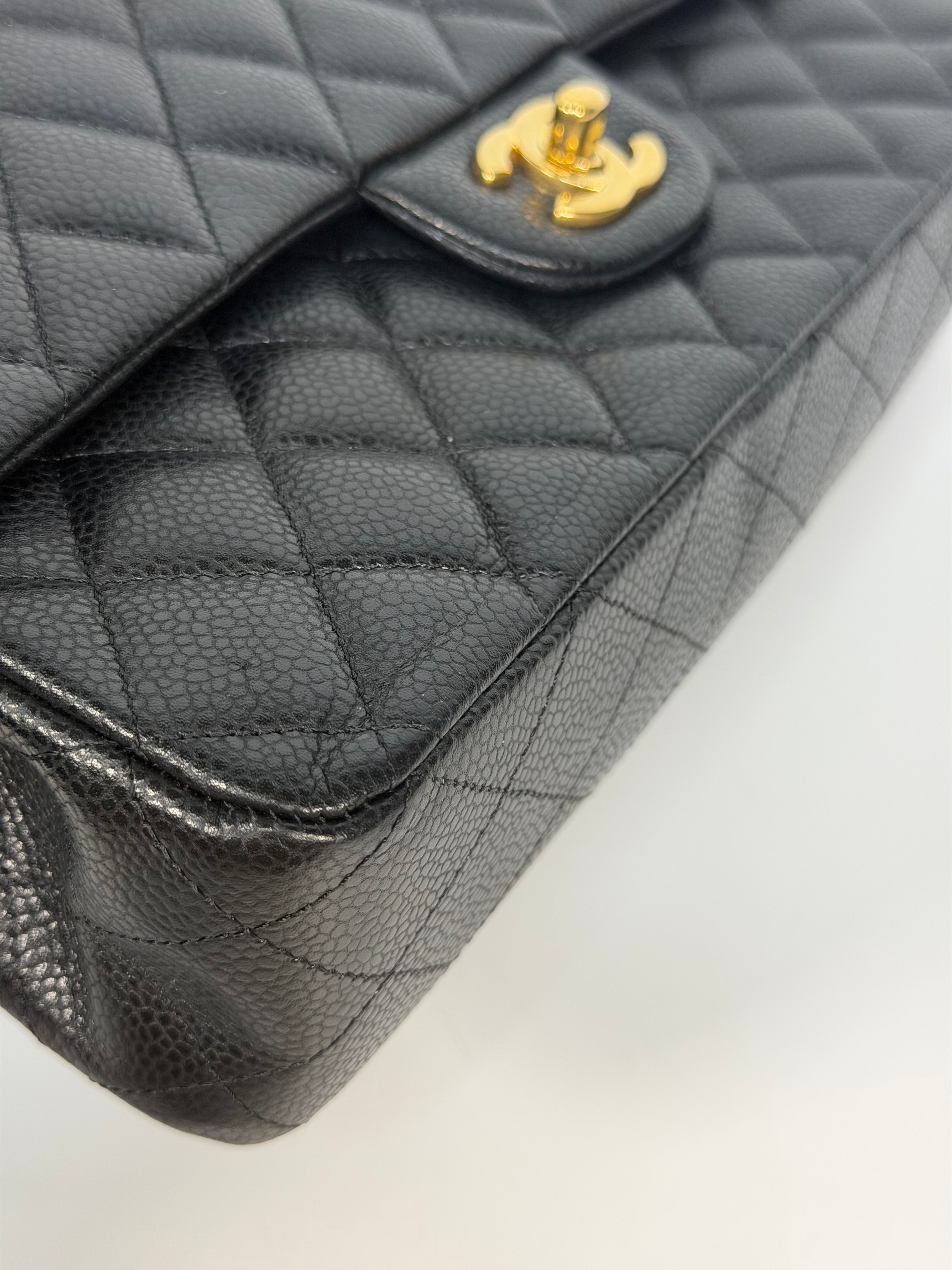Chanel Medium Classic Double Flap Black Caviar Leather With Gold Hardware. Authentic and preloved in excellent condition