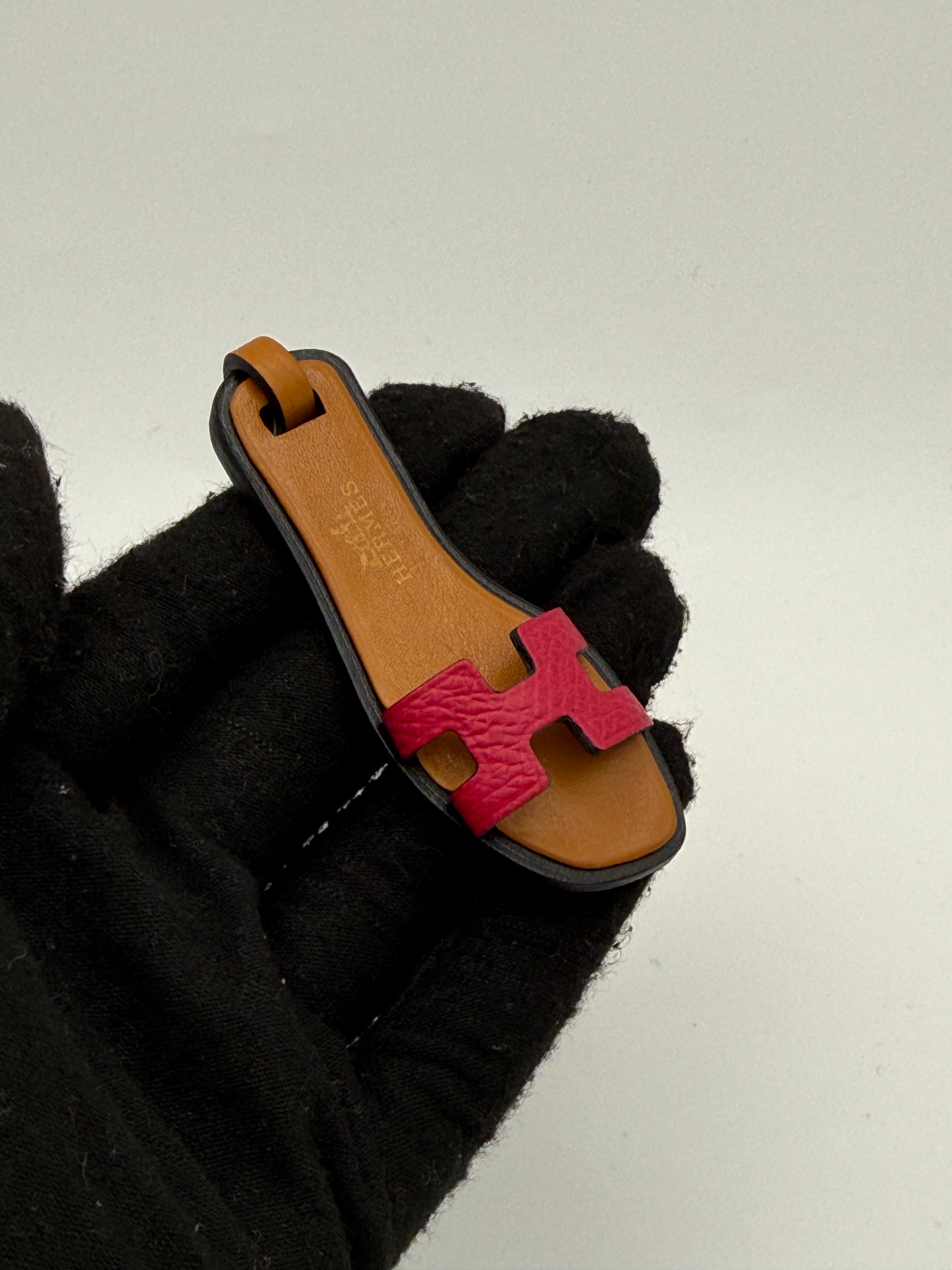 Hermes Oran Nano Bag Charm in Framboise/Natural Sable. Very Good Condition. Authentic and preloved