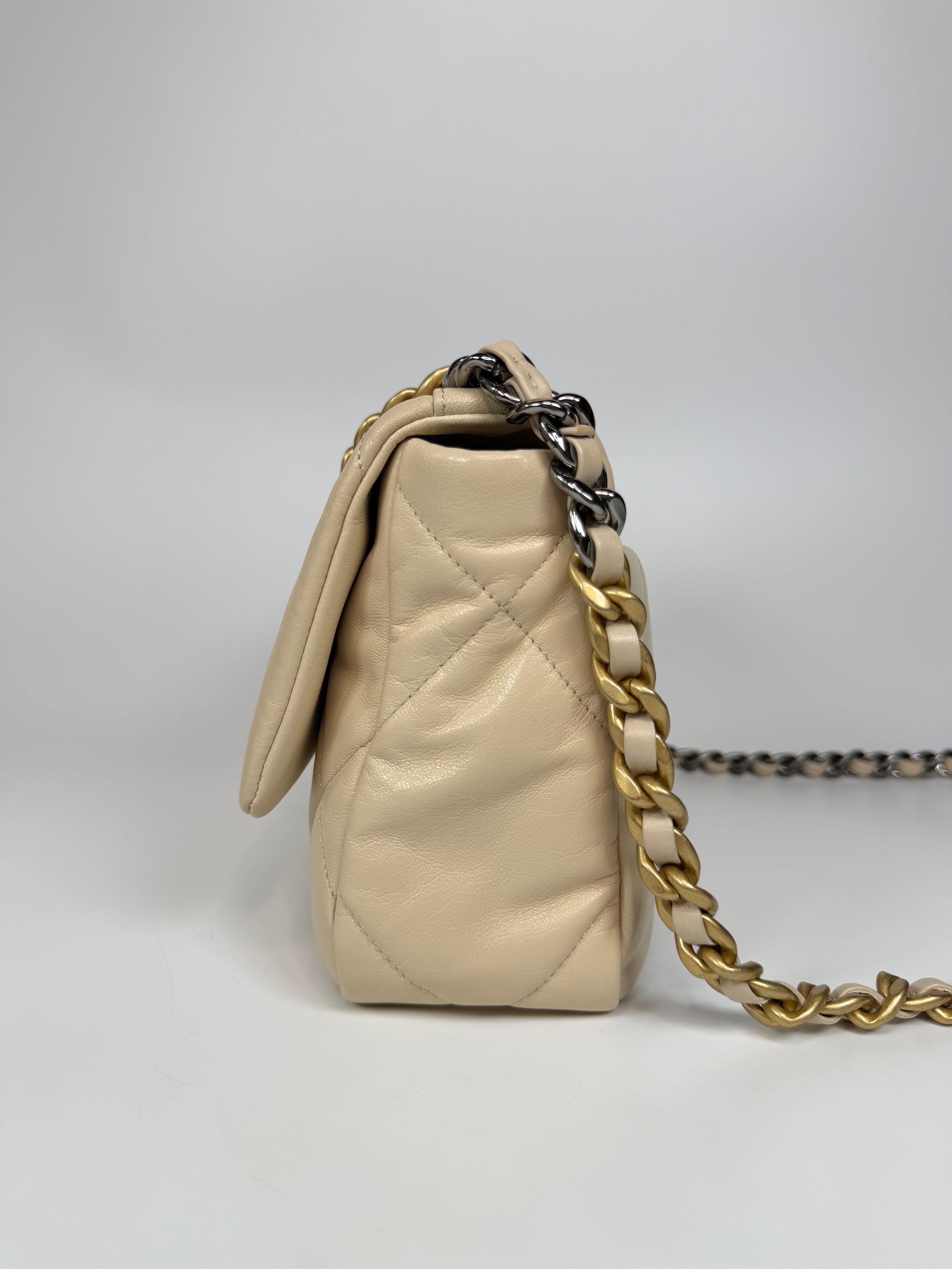 Chanel 19 Small In Beige Leather With Mixed Hardware. Authentic and preloved in excellent condition. Verified by Luxe Cheshire.
