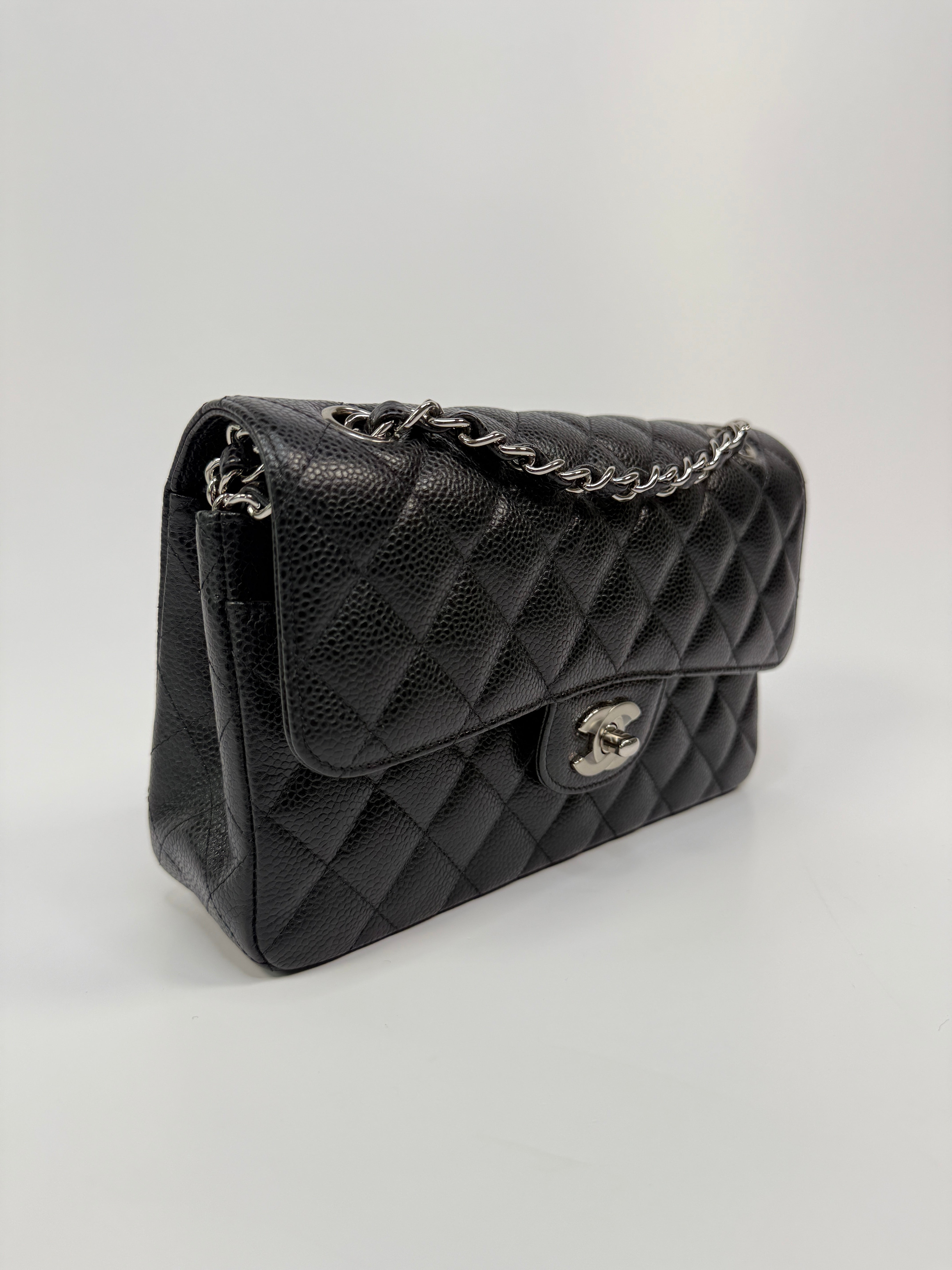 Chanel Small Classic Double Flap In Black Caviar Leather With Silver Hardware
Pre Loved & Authentic