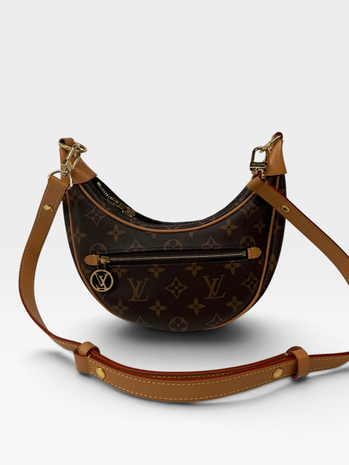 Louis Vuitton Loop Bag In Brown Monogram With Gold Hardware. 100% authentic and preloved in excellent condition