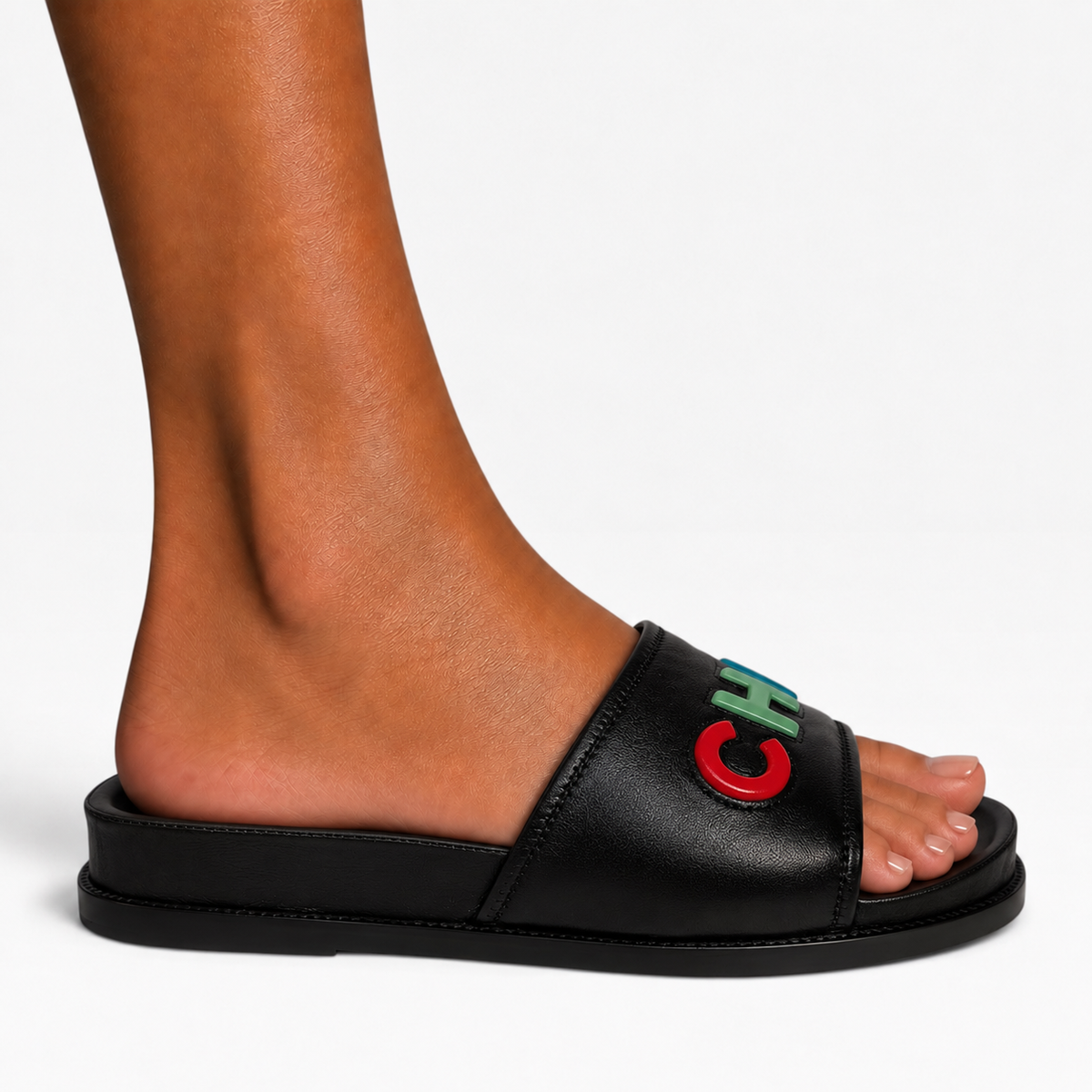 Chanel Multicolour Logo Slide Sandals In Black Leather. 100% authentic and preloved in excellent condition