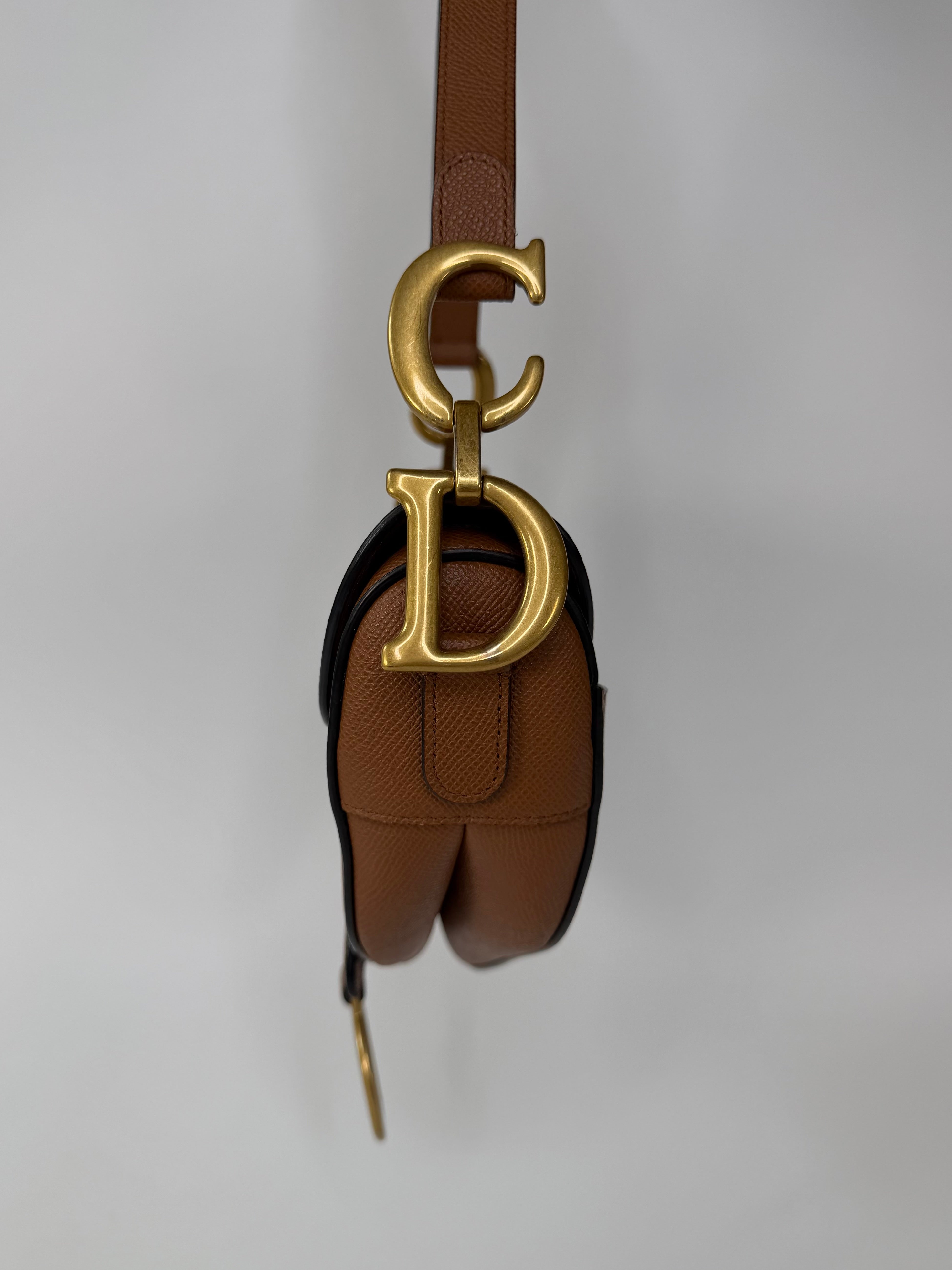 Christian Dior Saddle Bag In Golden Calfskin Gold Hardware. 100% authentic and preloved in excellent condition.