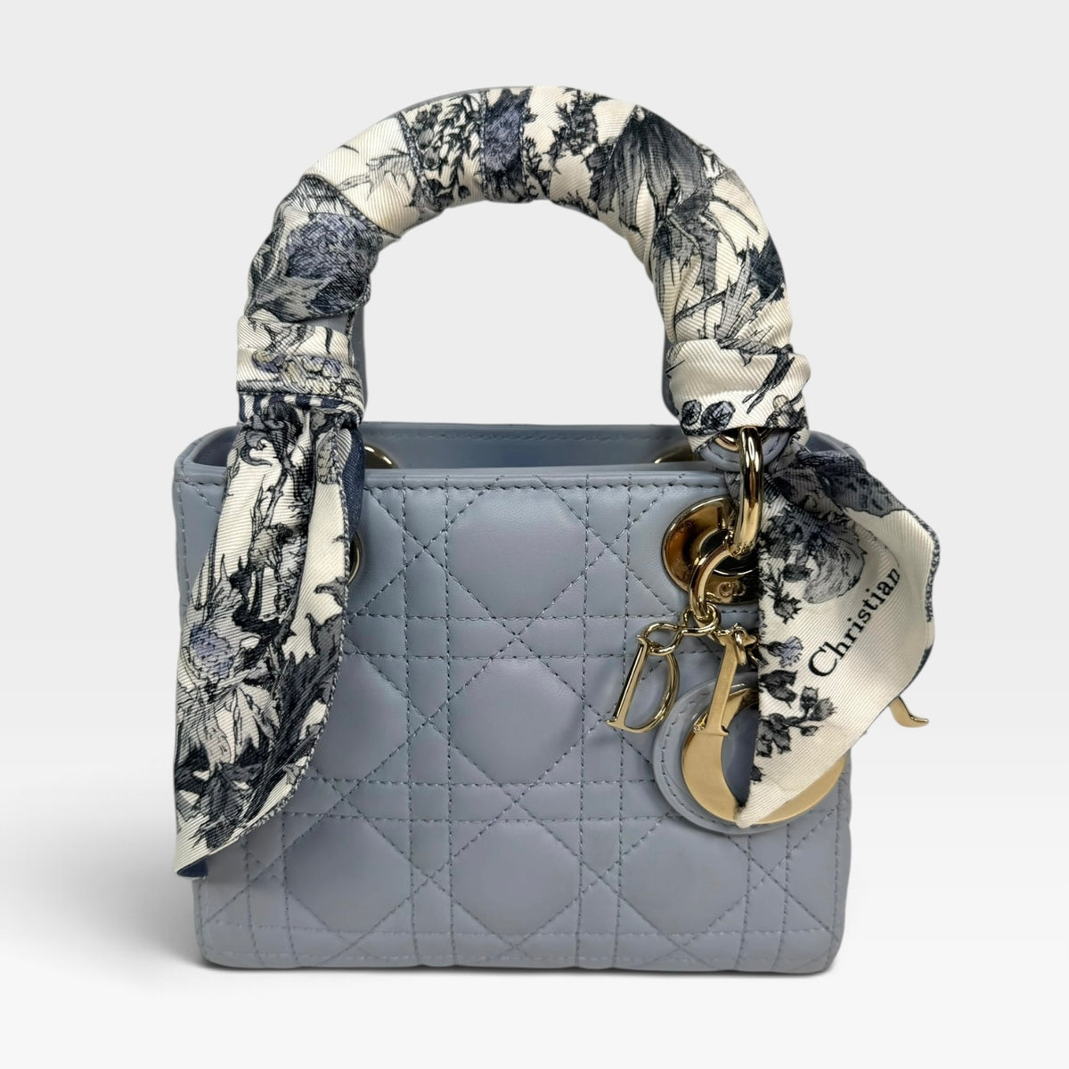 Christian Dior Mini Lady Dior In Pale Blue Cannage Leather With Pale Gold Hardware. 100% Authentic and Preloved in excellent condition. 100% Guarantee