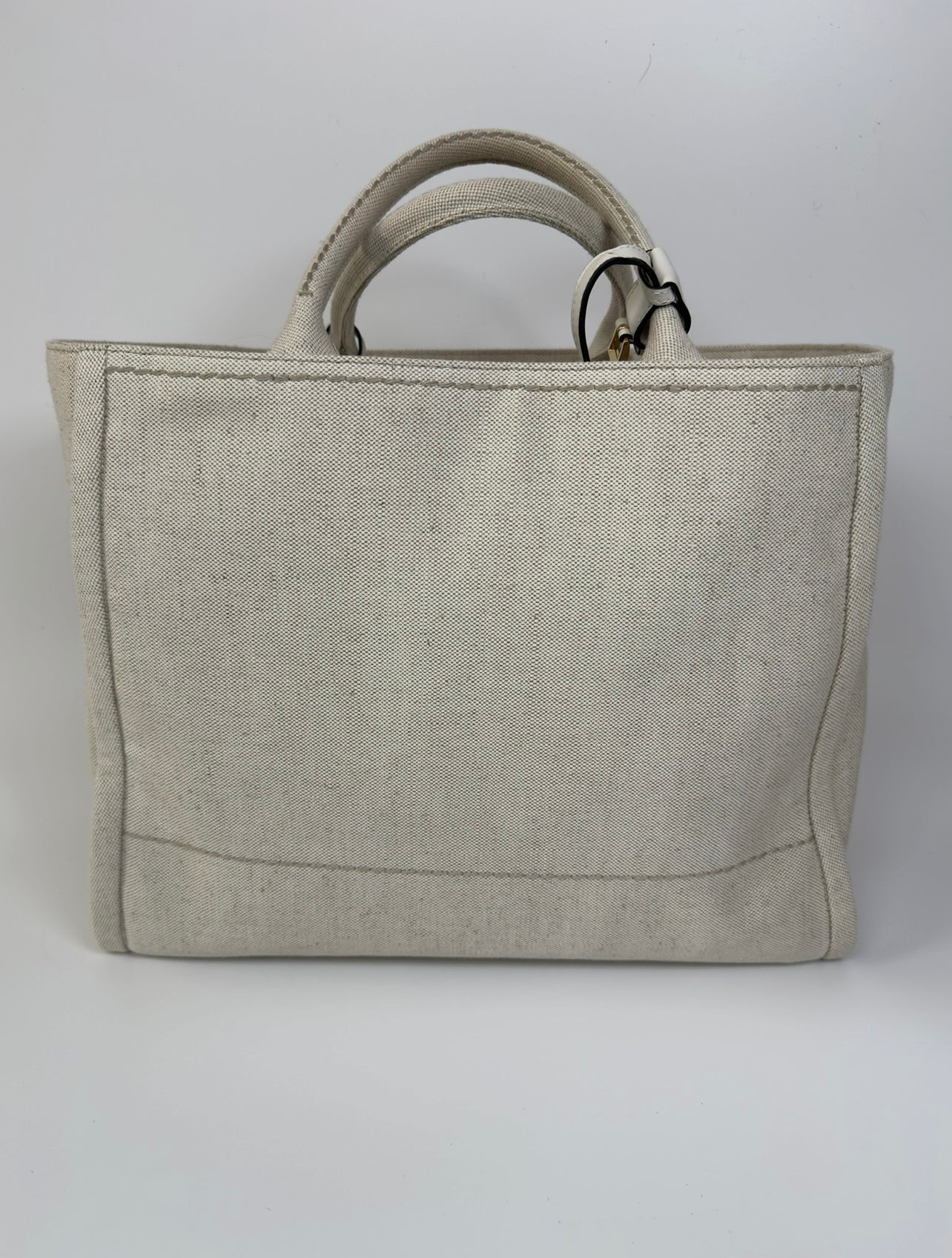 Authentic and preloved Prada Large Appliqué Cotton Tote In Sand Beige Canvas. Excellent Condition. 100% Authenticity guarantee.