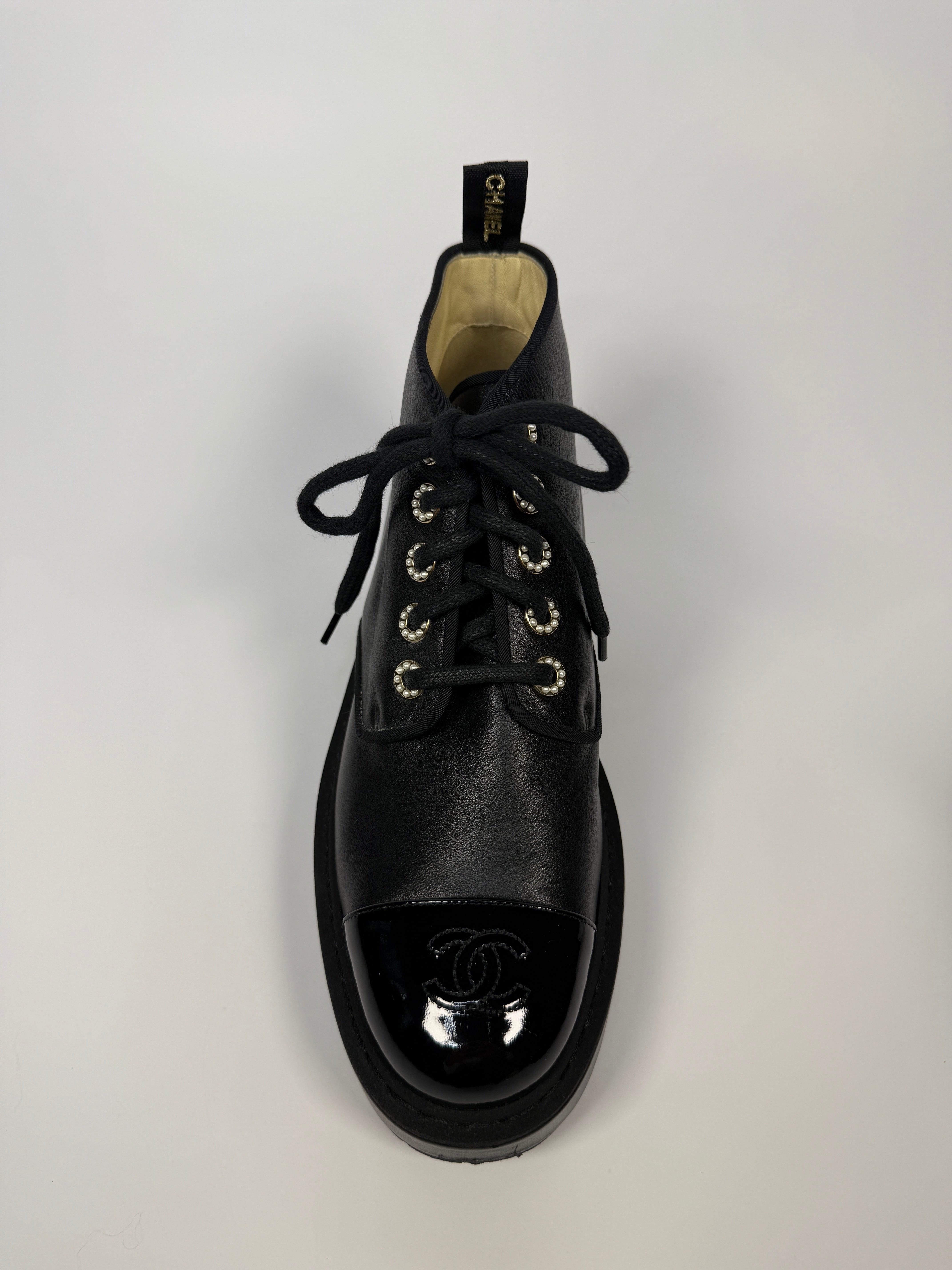 Chanel CC Toe Cap and pearl eyelet Anklet boots In Black Leather. UK6.5 Excellent. Authentic and preloved.