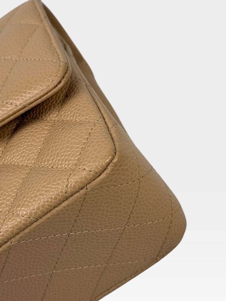 Chanel Medium Classic Flap In Beige Caviar Leather With Gold Hardware. 100% authentic and preloved in excellent condition