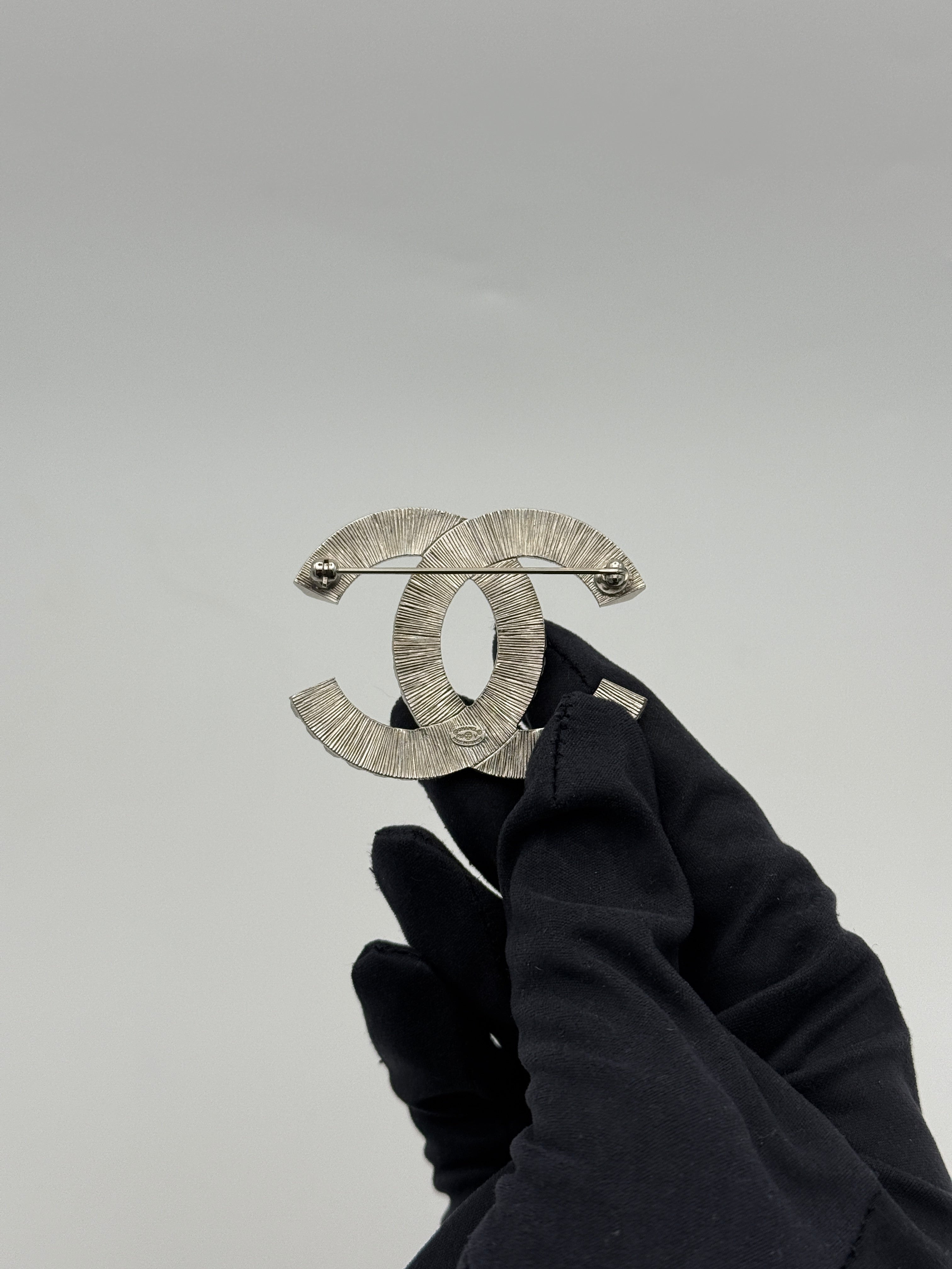 Chanel CC Rhinestone Brooch Silver. Authentic and preloved in excellent condition