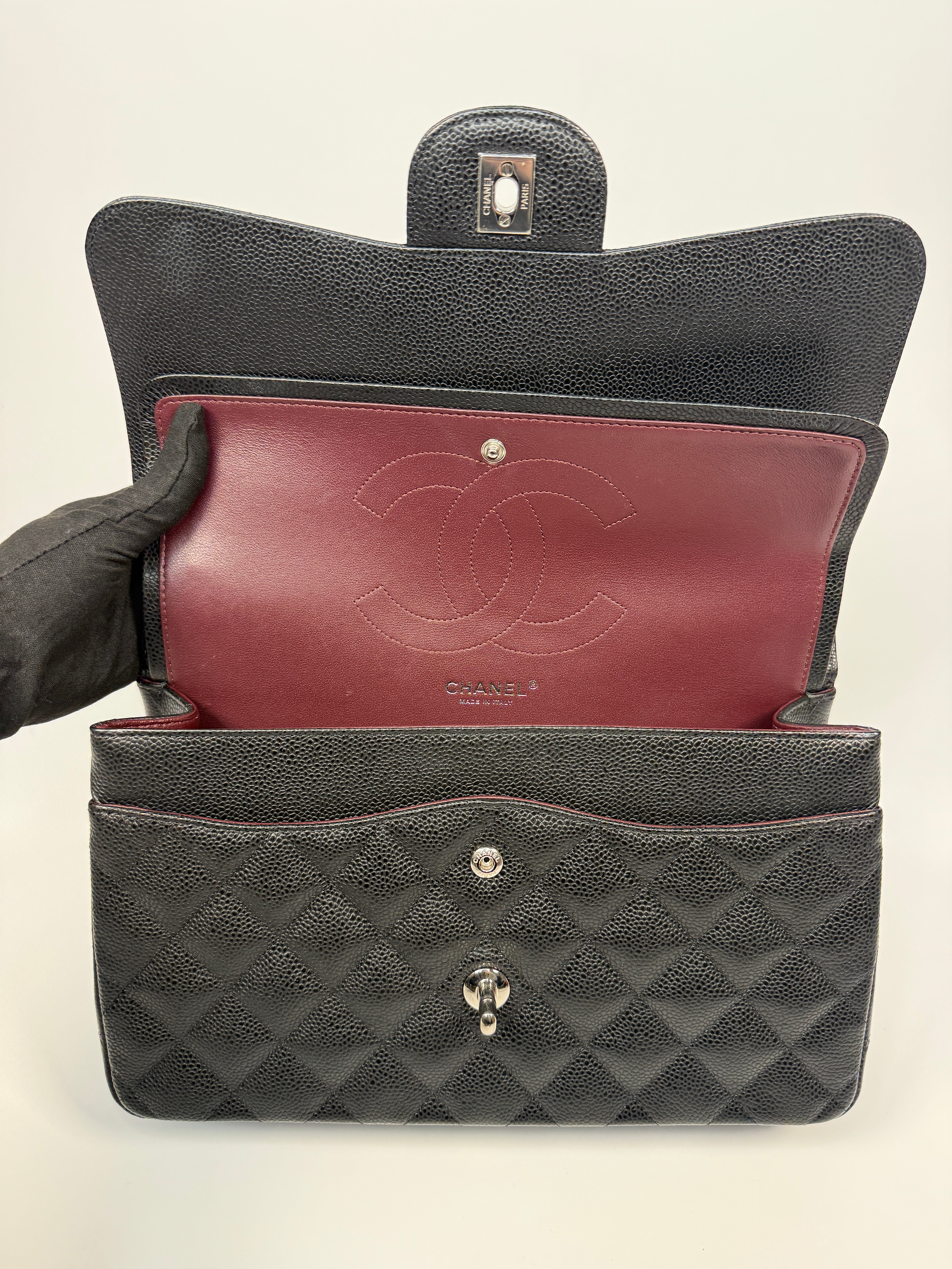 Chanel Classic Jumbo Flap Bag In Black Caviar Leather With Silver Hardware. Authentic and preloved. Excellent condition.