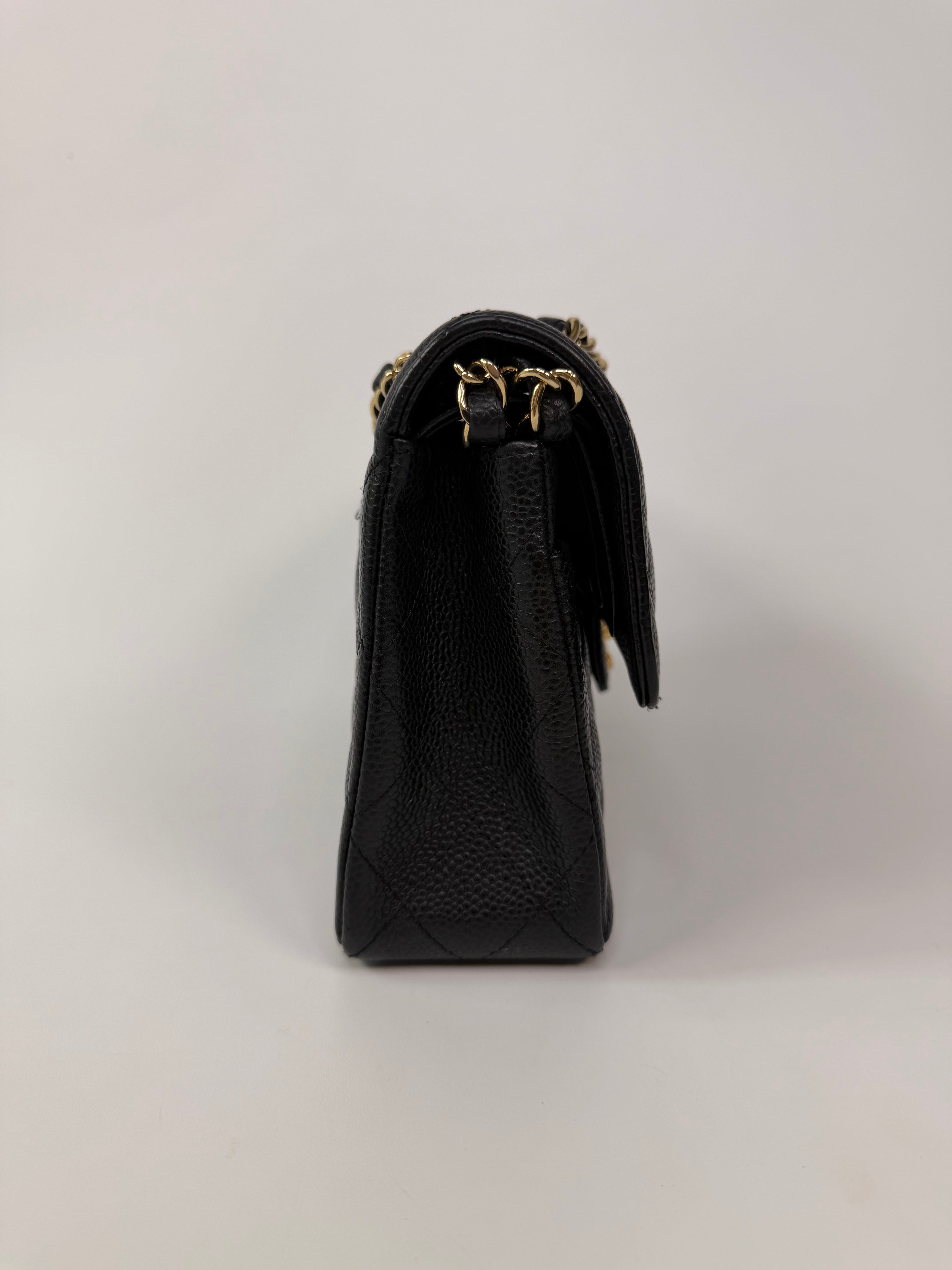 Chanel Small Classic Double Flap In Black Caviar Leather With Gold Hardware. 100% authentic and preloved in excellent condition